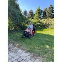 He sure loves his tractor!