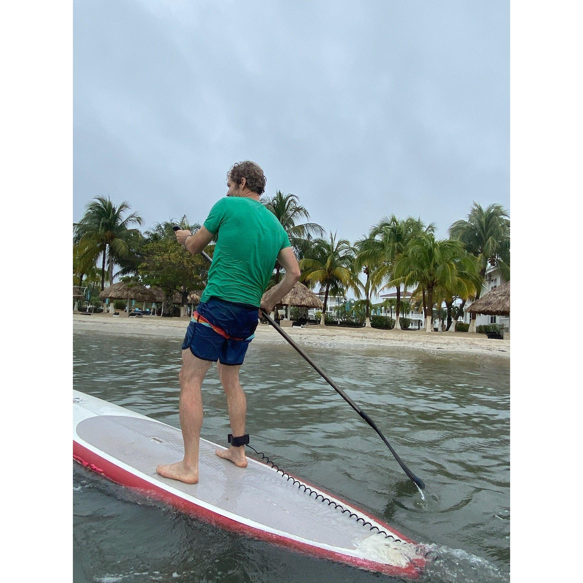 Paddleboarding in Placencia at 6am in the morning.