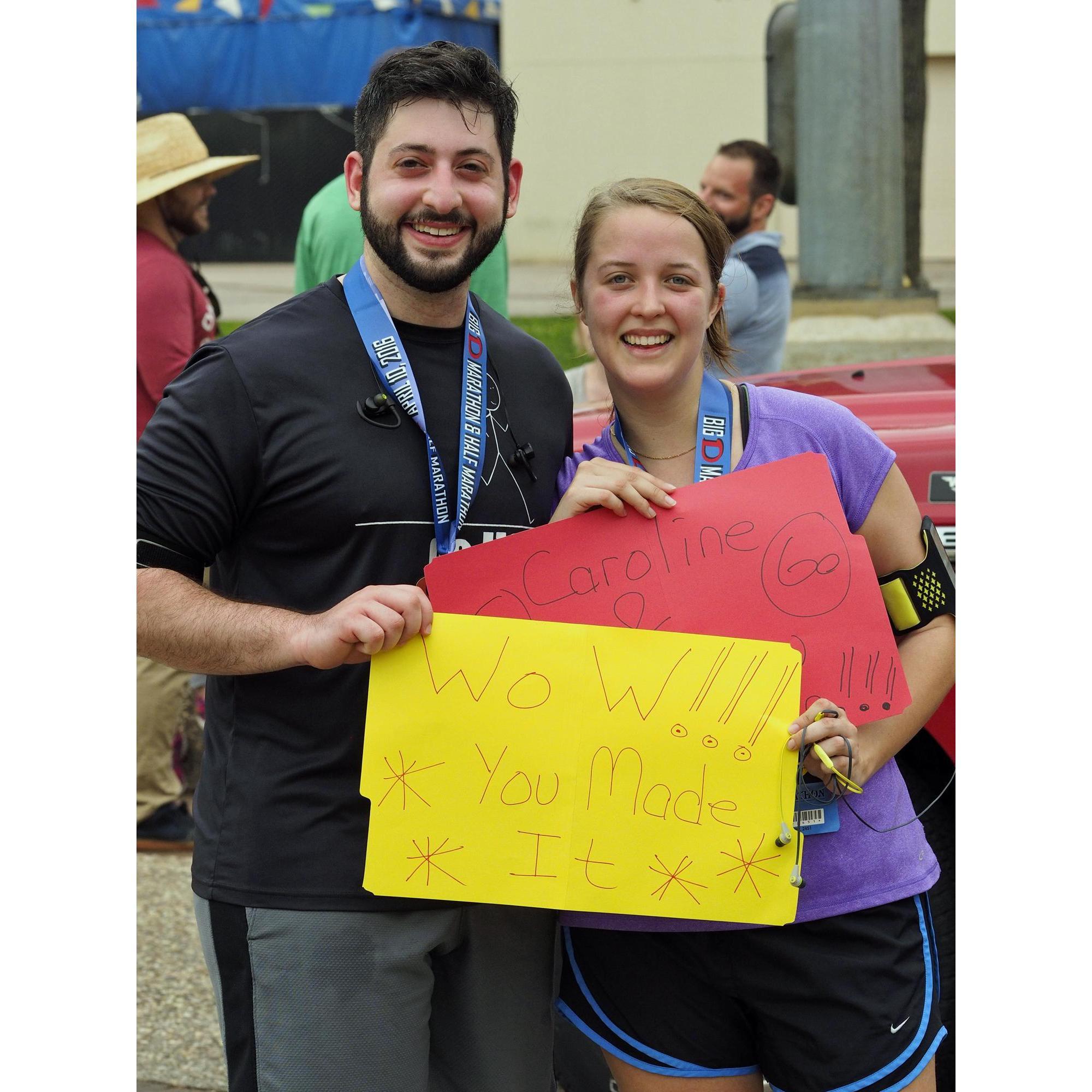 Sweet signs at the finish line by my mama, not pictured: how horribly sick I got 10 minutes later from all the water I drank and lack of food...