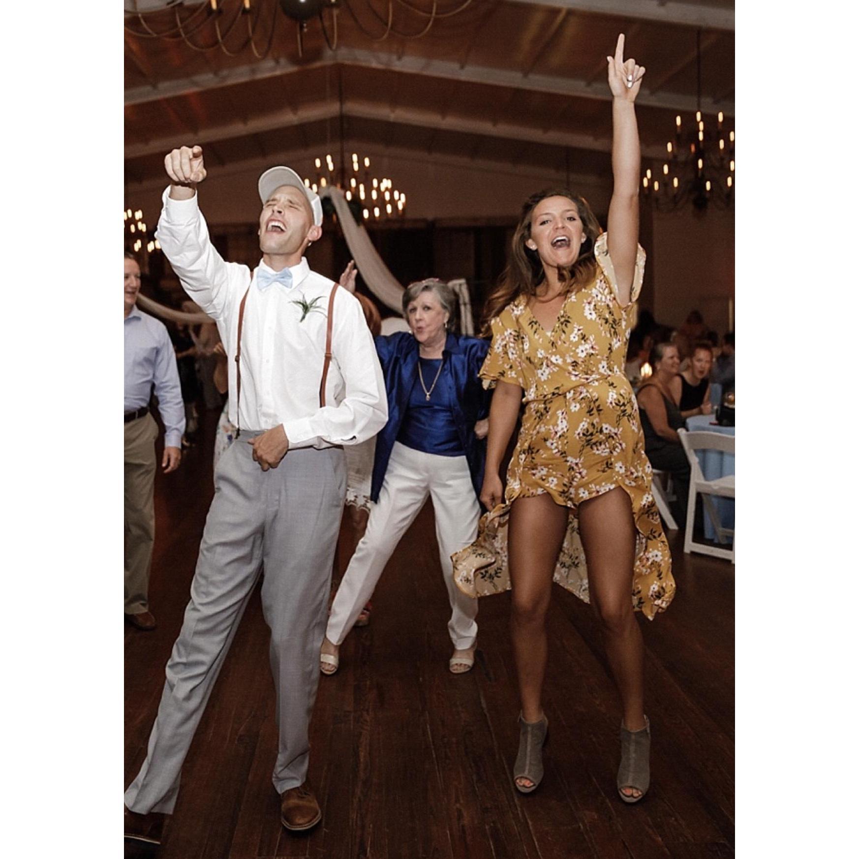 One of my all-time favorites of us! This was at his sister's wedding and we were obviously LOVING "Mustang Sally." I think this captures our personalities so well -- we love to have fun!