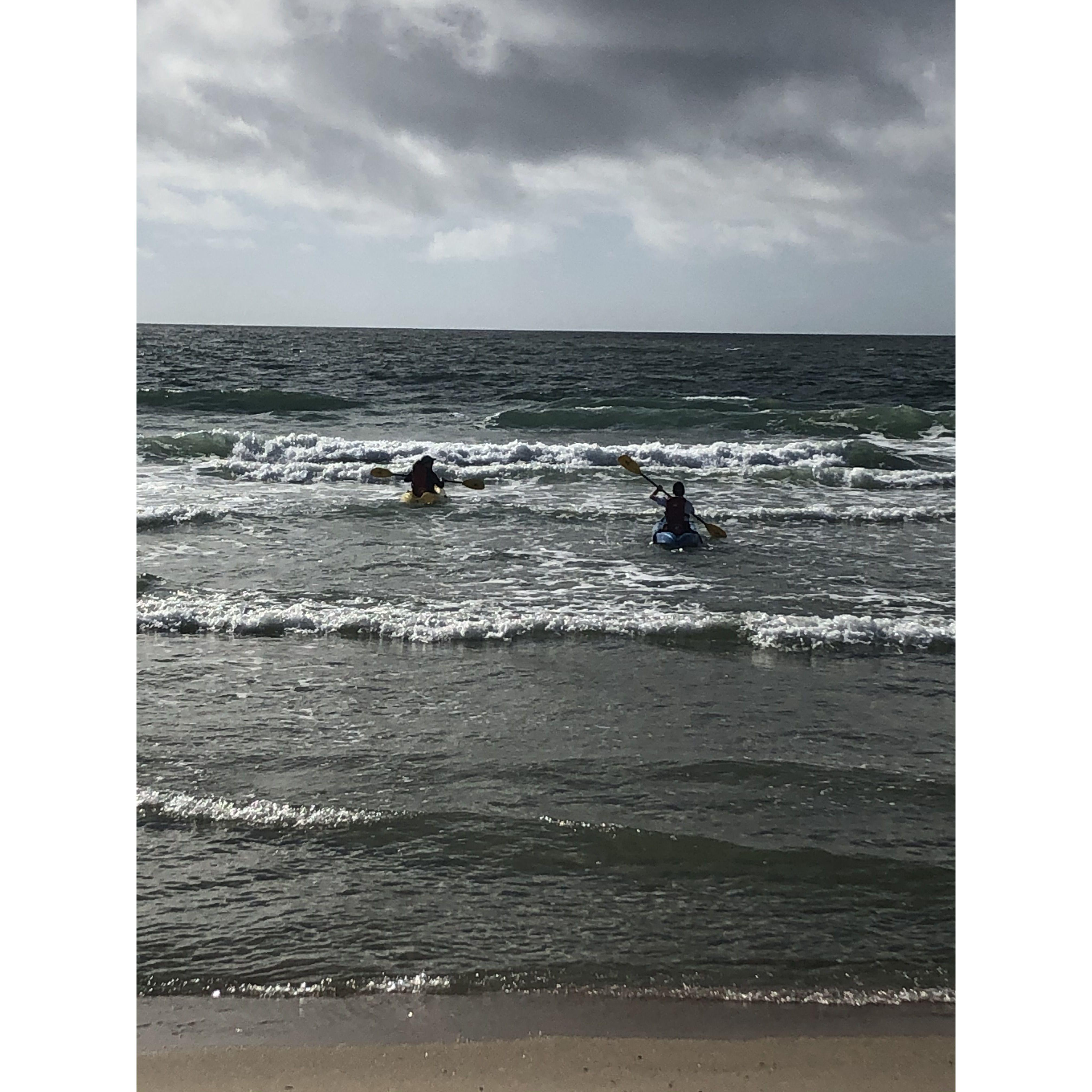 Olivia and Vince kayaking in the Ocean at Harvey Cedars in New Jersey in 2022.
