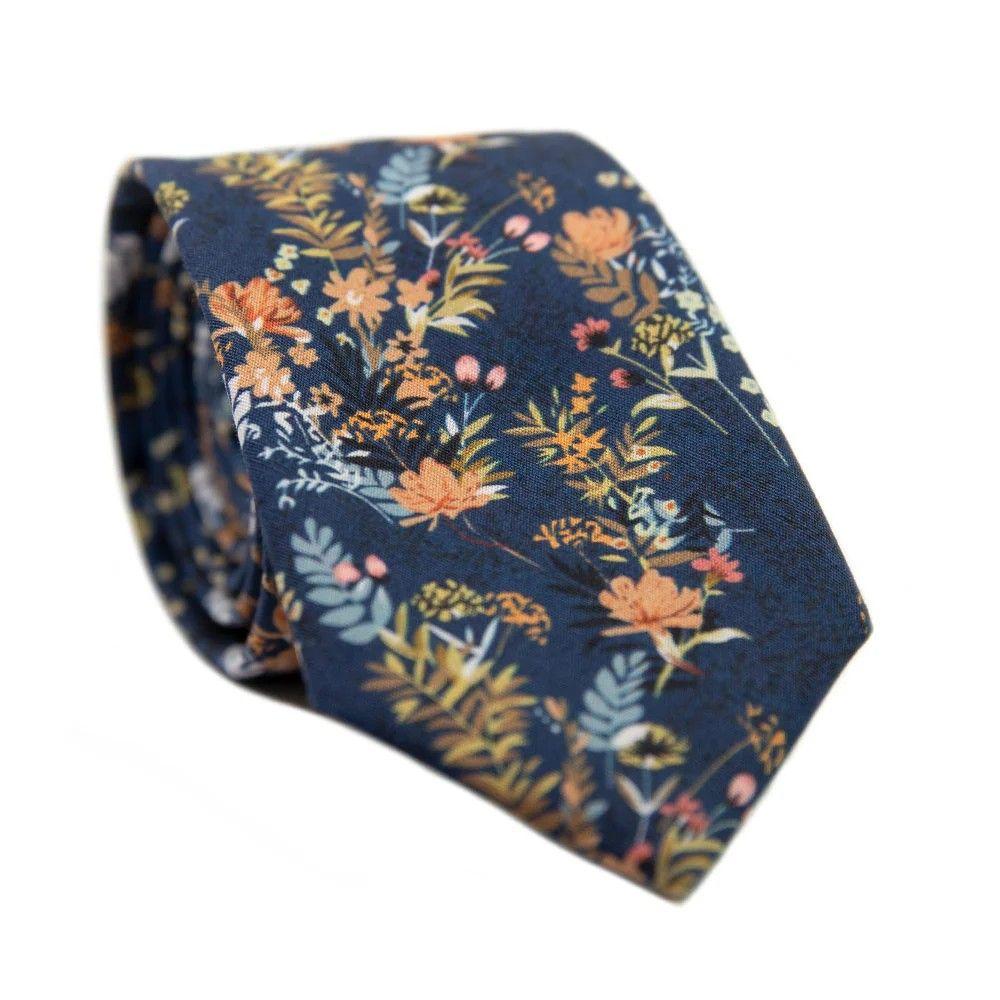 Tie for wedding party gents wearing brown dress pants.