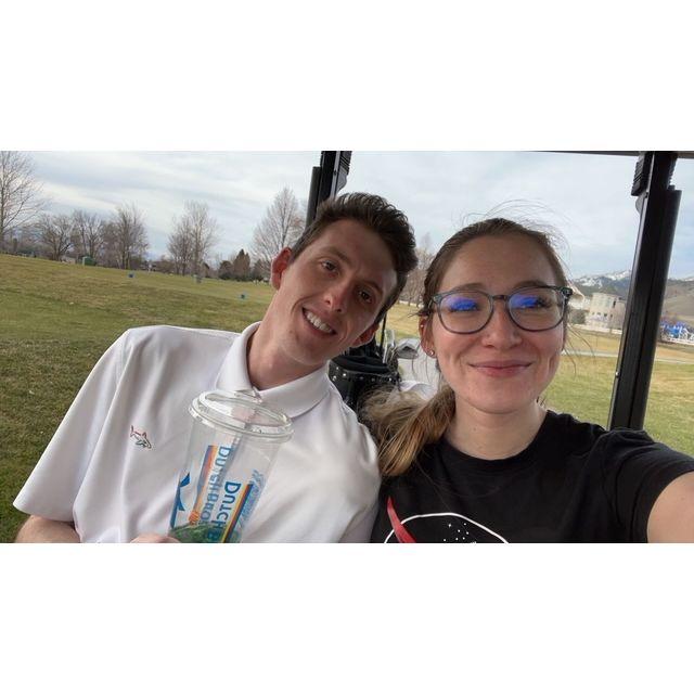 Daniel teaching me how to golf
