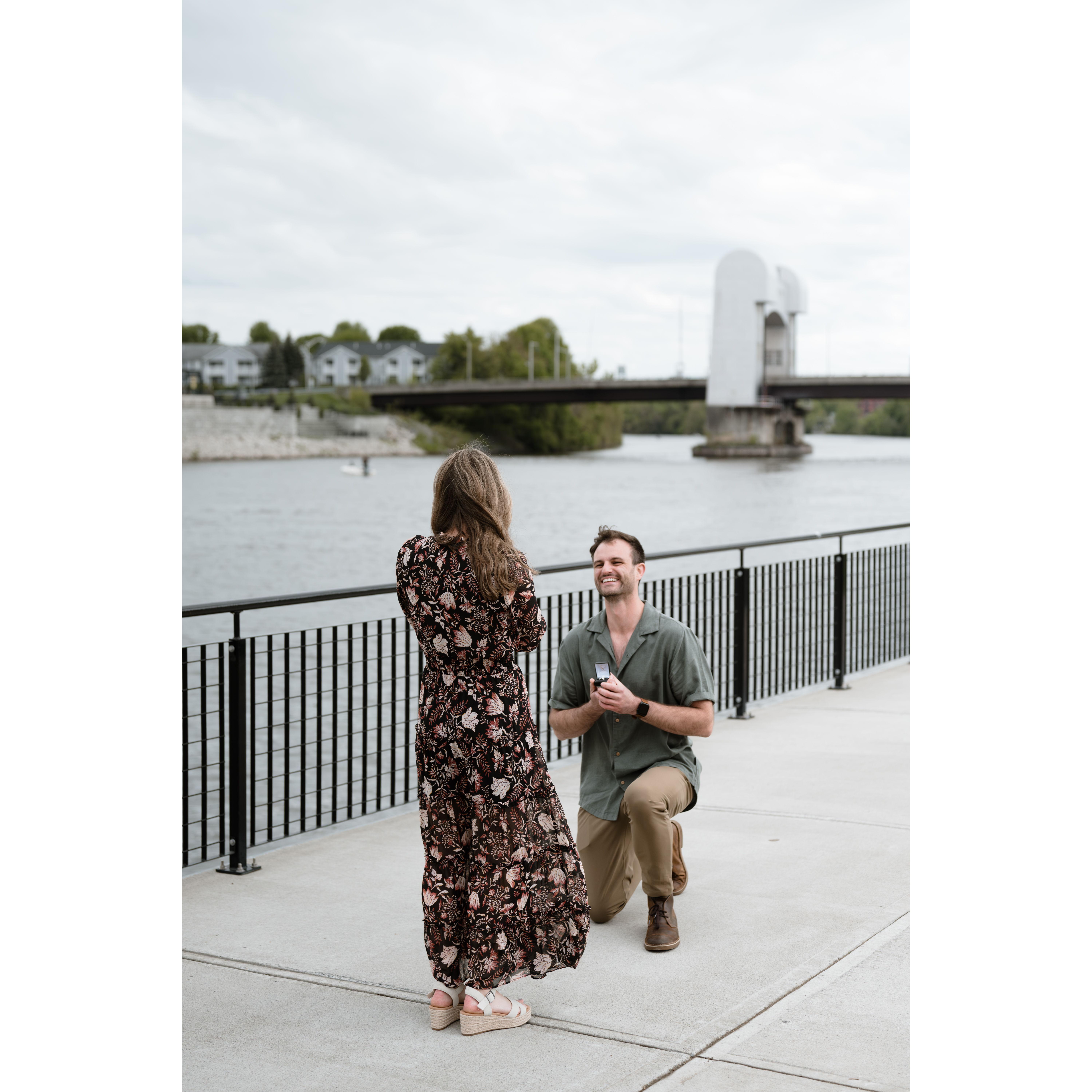 Michael got down on one knee and said “I love you Alyx, will you marry me?”. Filled with excitement, Alyx forgot to say “Yes!” and kissed him instead.