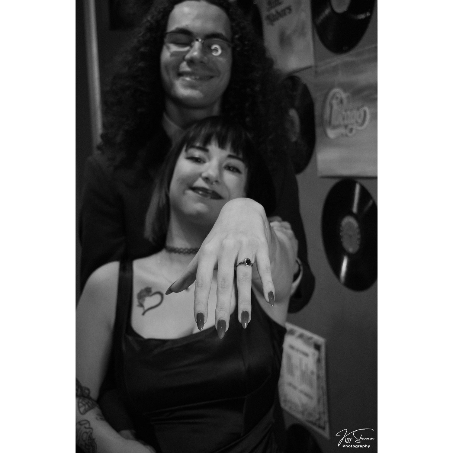 Showing off the ring!
(Engagement session)