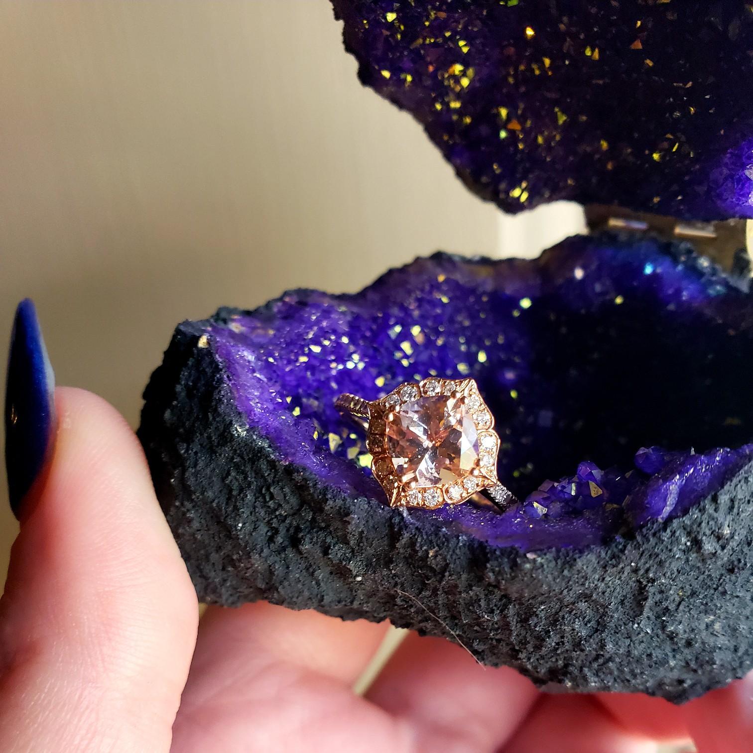 Everyone wants to see the ring... right?? Its a morganite in rose gold with diamonds accenting. This is the geode ring box Garrison used to propose!