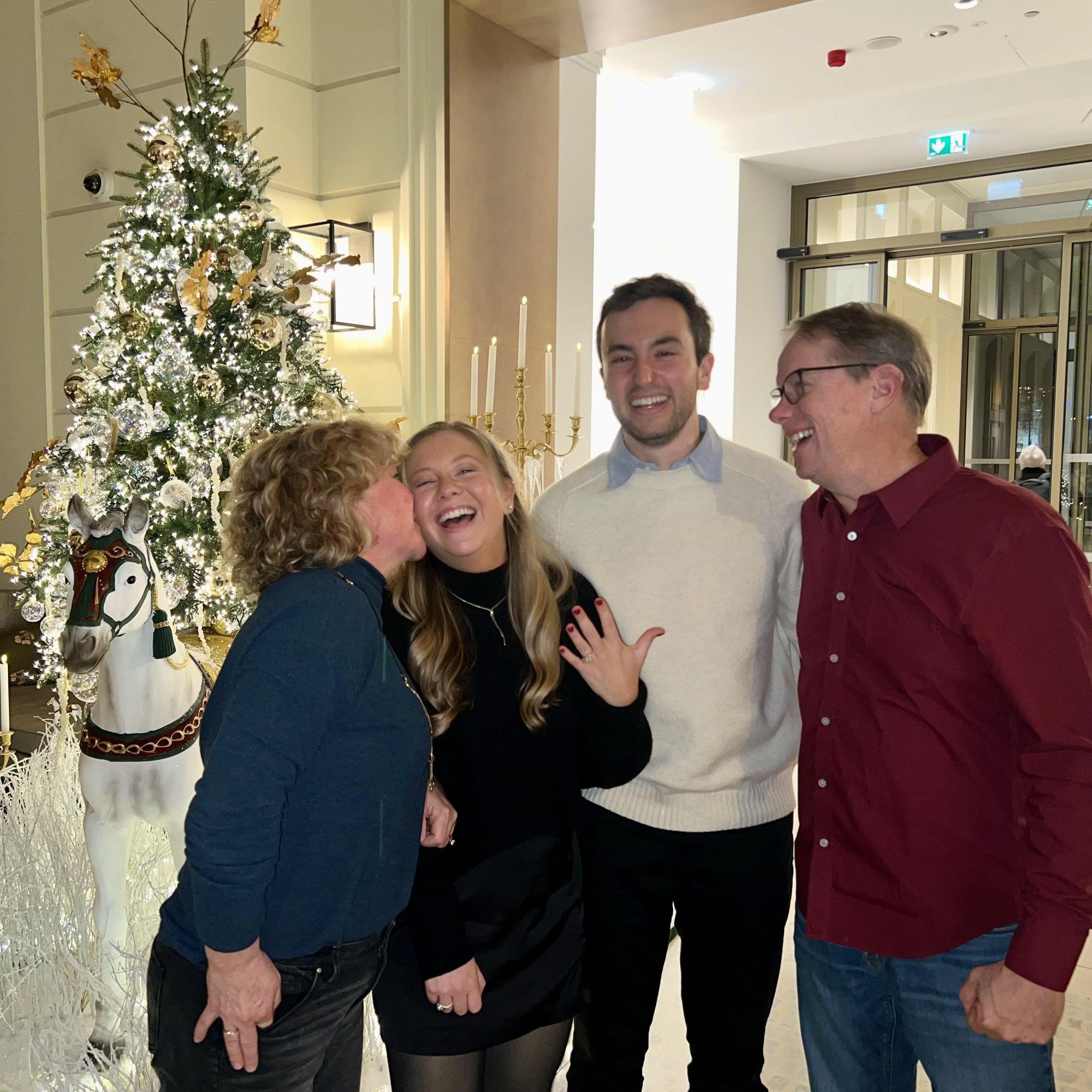 Celebrating with Katie's parents after Zach proposed