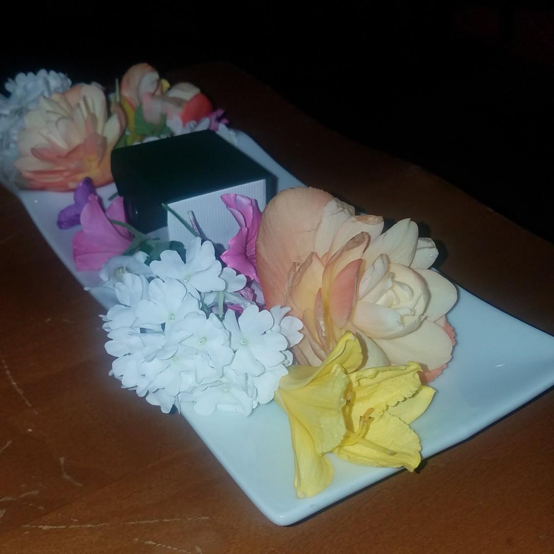 Engagement ring on the platter at Sorrentos