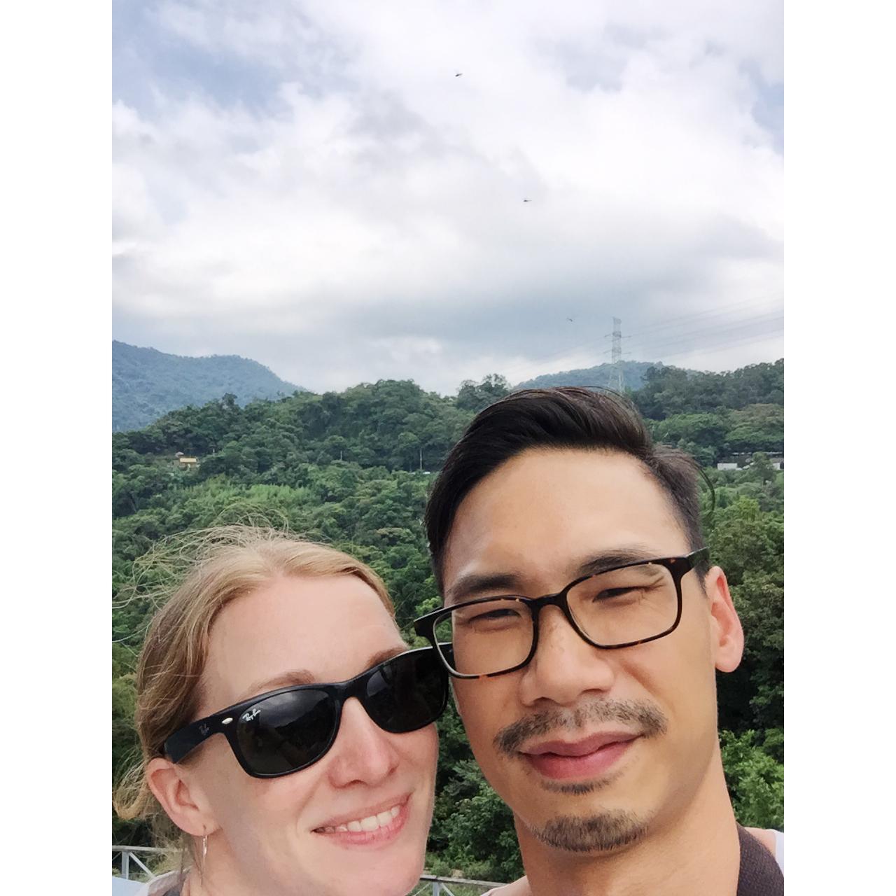 Michele and Henry enjoy the view at the top of Maokong Mountain in Taiwan.