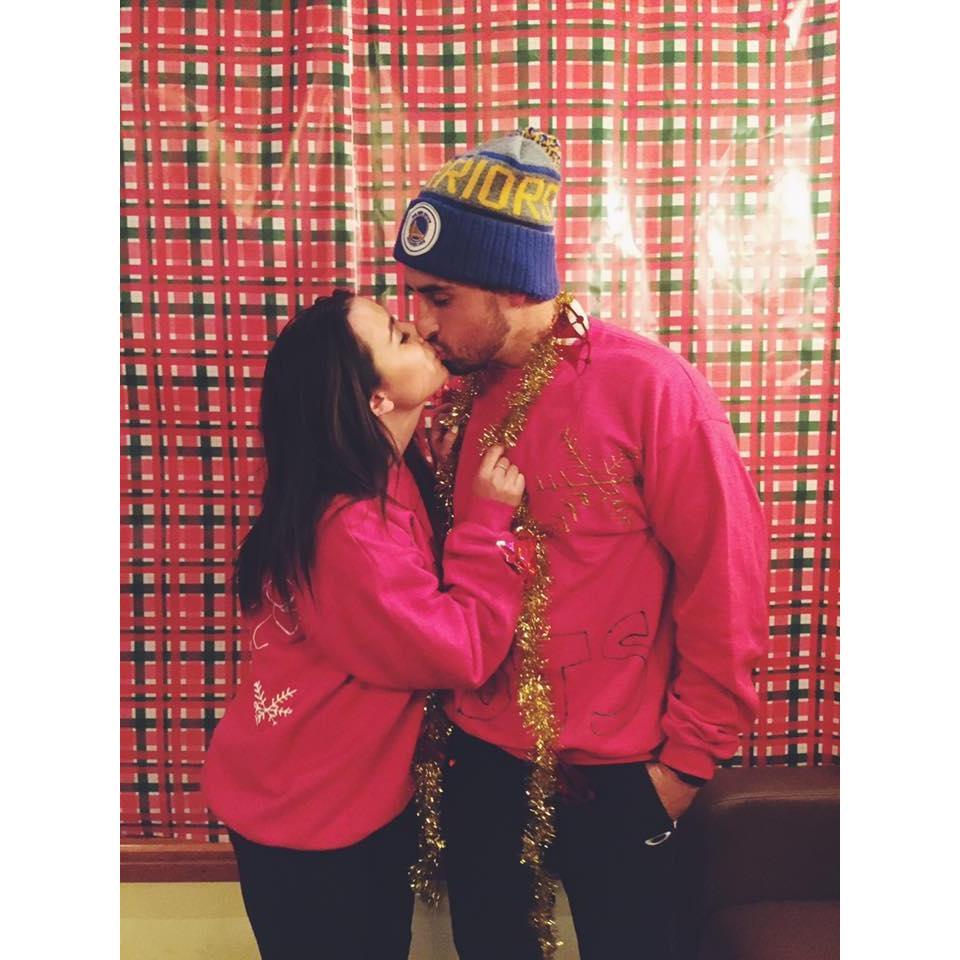 Our first Christmas together at our work Christmas party.