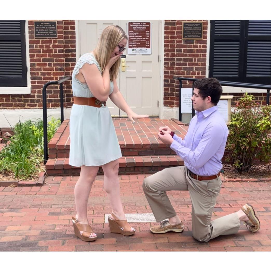 Joseph proposed to Hope on April 28th, 2021, in the center of the historic square in downtown Dahlonega.