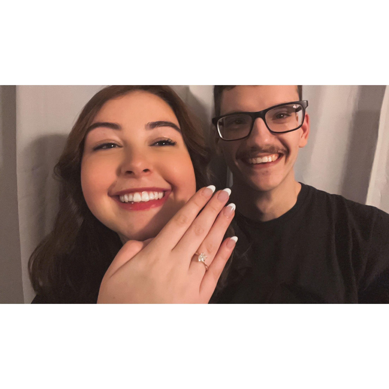 Us taking the photo to tell everyone we were engaged! :D 2025
