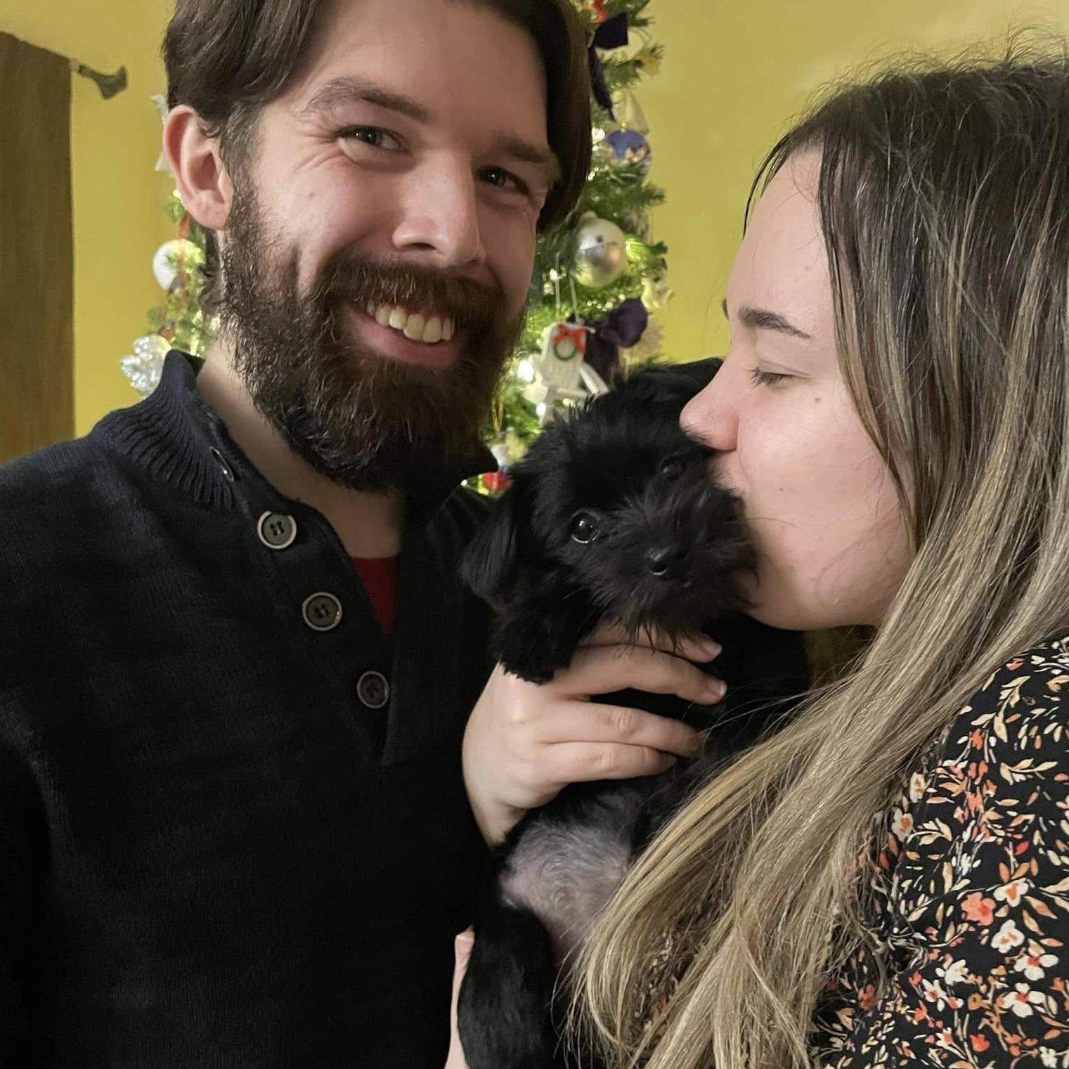 First Christmas as a family of 3...yes she is our child.