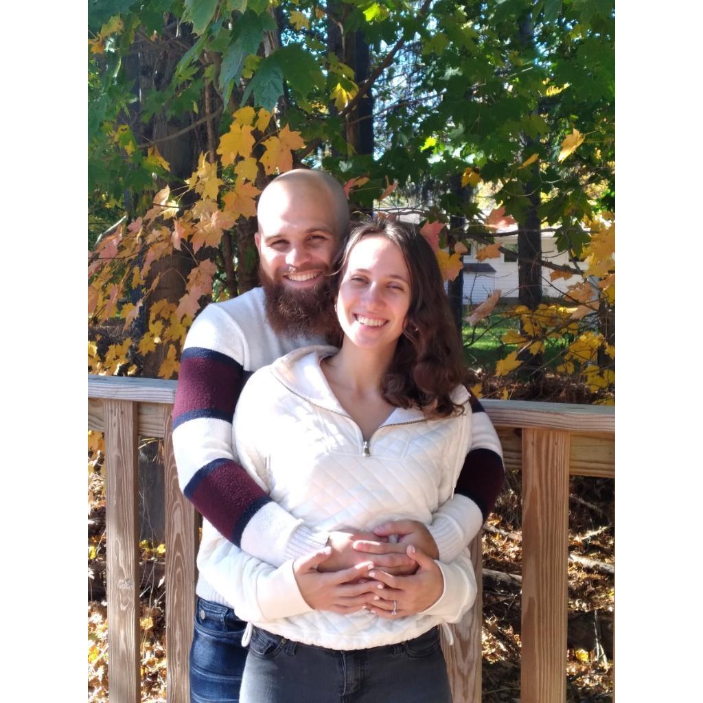John flew out to MA and surprised Natasha by popping the question after she came home from work! October 28, 2022.
