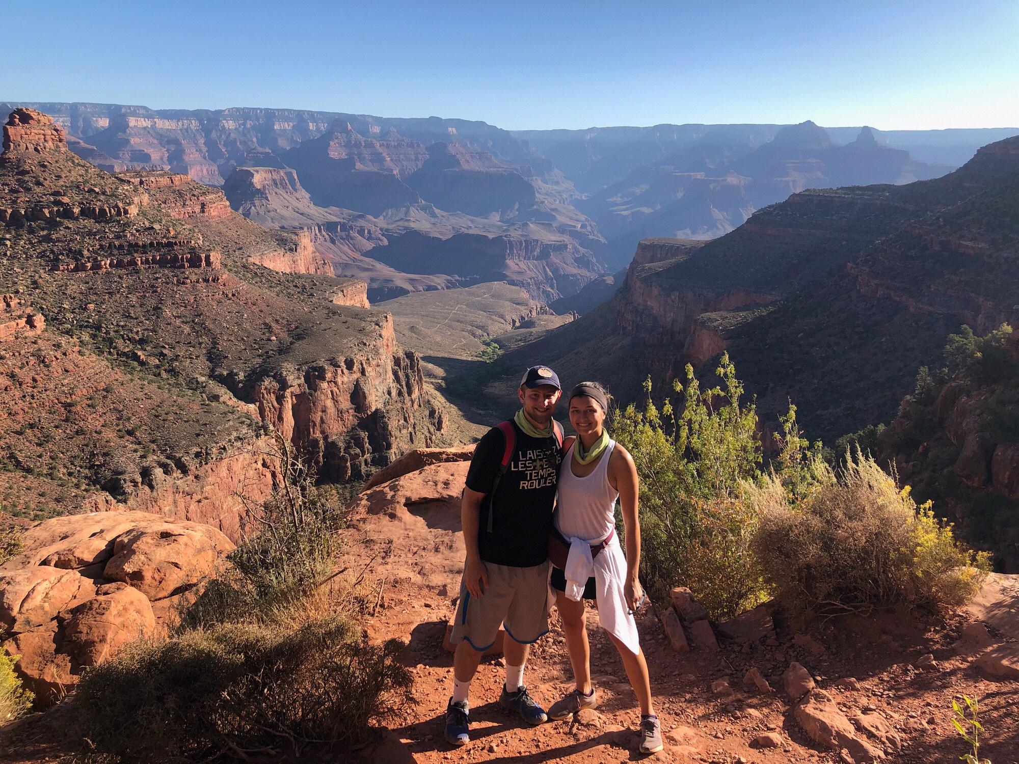Newly fianceed and taking on the majestic Grand Canyon.