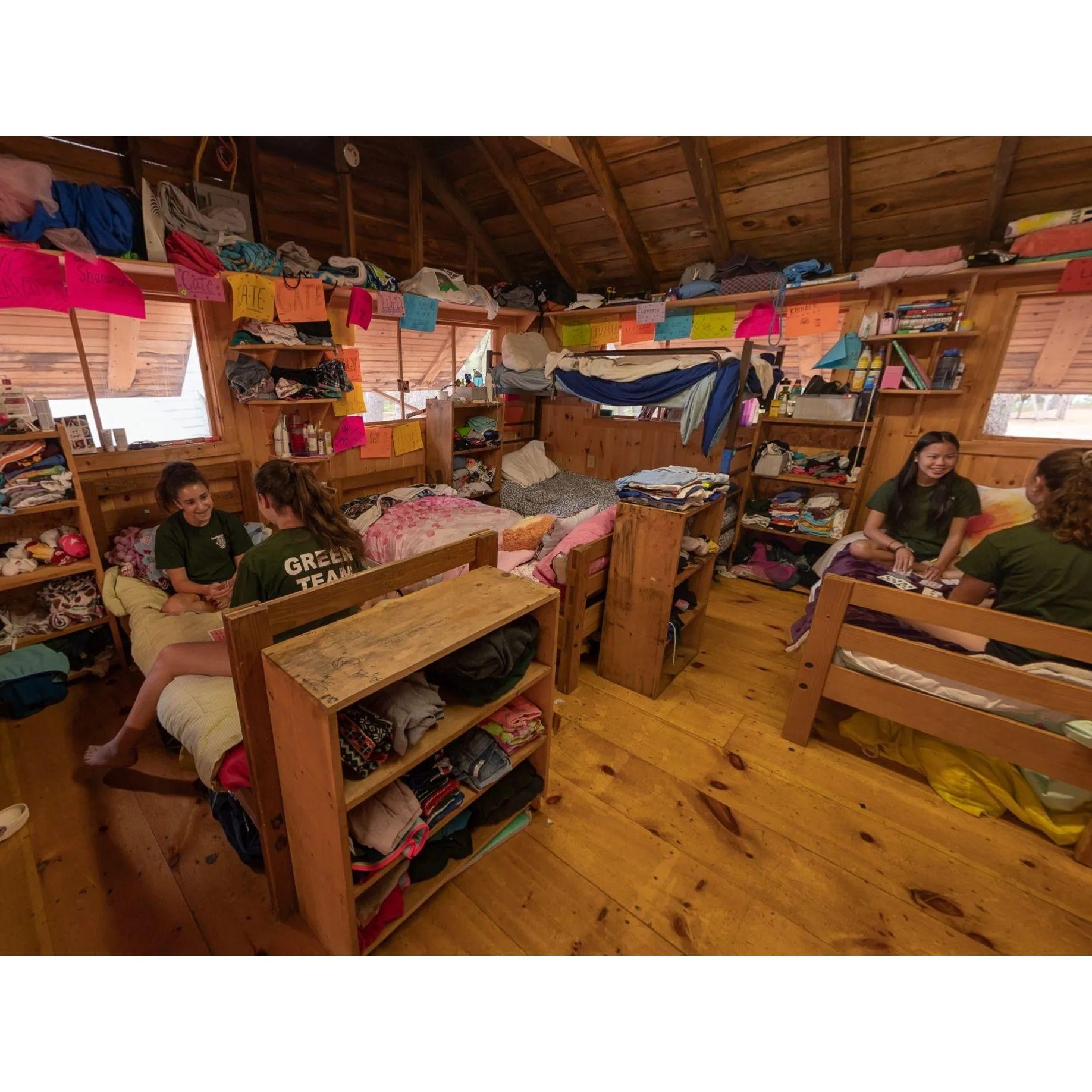 The shared cabins have all been updated within the past 8 years, and are designed as open, communal living spaces. They contain bunk beds and also single beds that can be pushed together for couples
