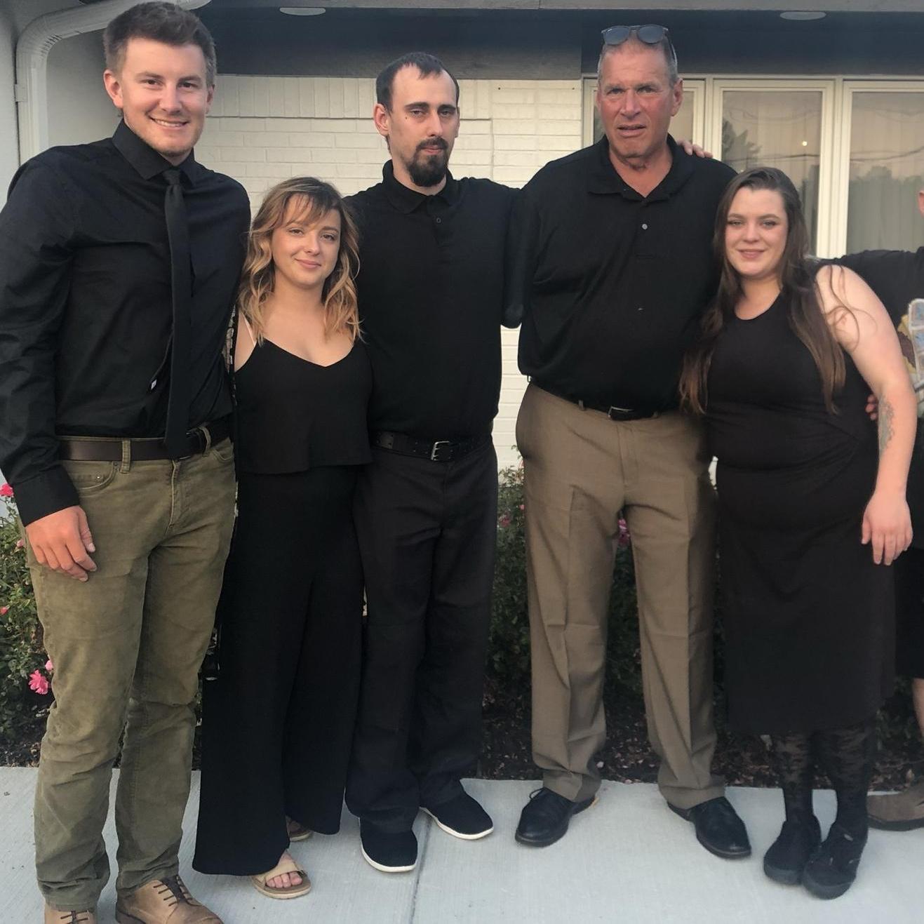 5 August 2021 - Family photo with Kali's siblings and dad at Kim's funeral.