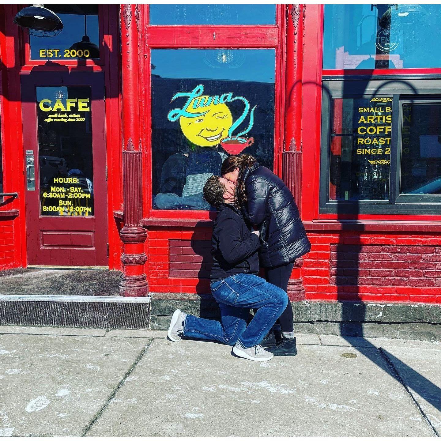 A picture of the most amazing proposal, right outside of where we had our first date.