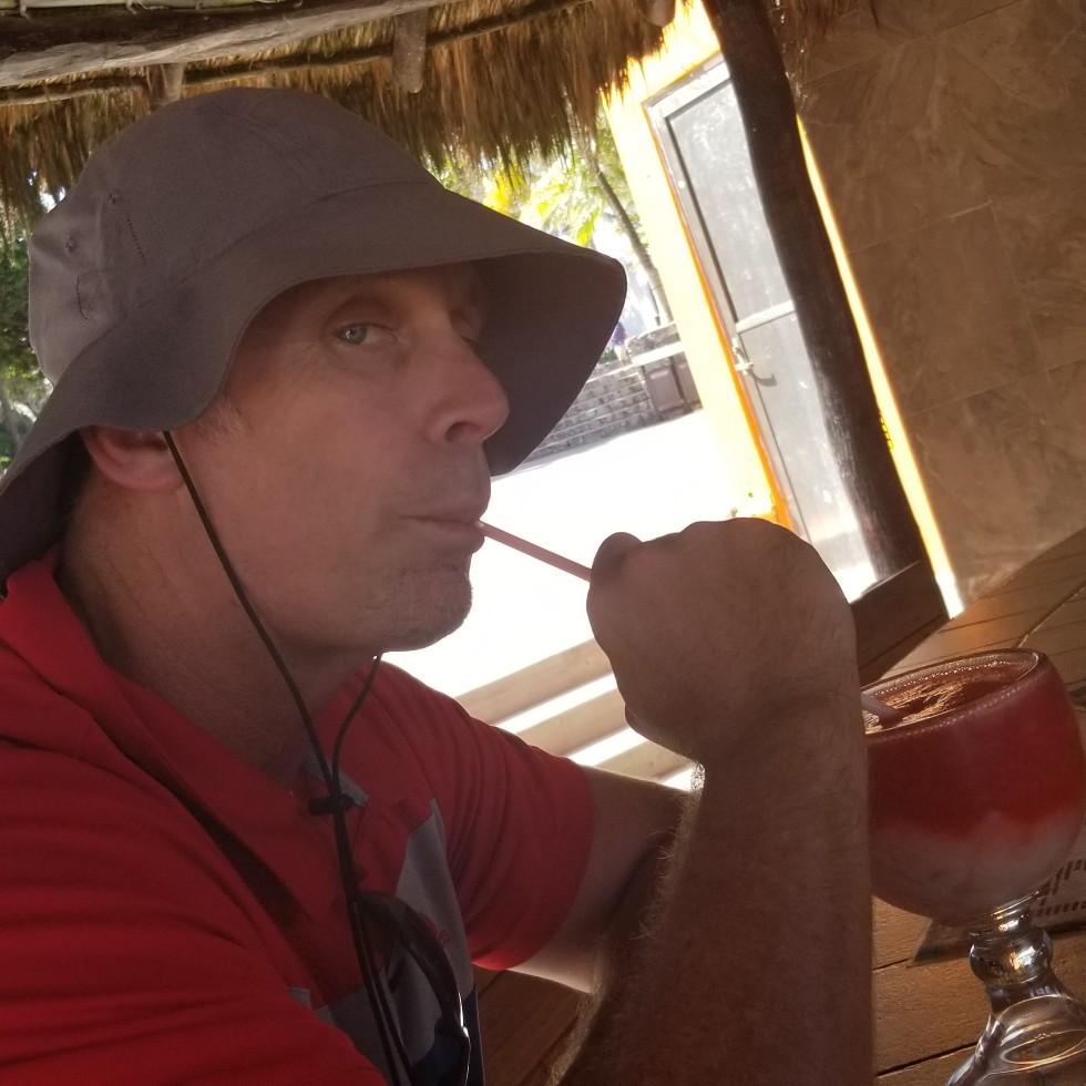 Baby drinking his manly Lava Flow in Downtown Cabo