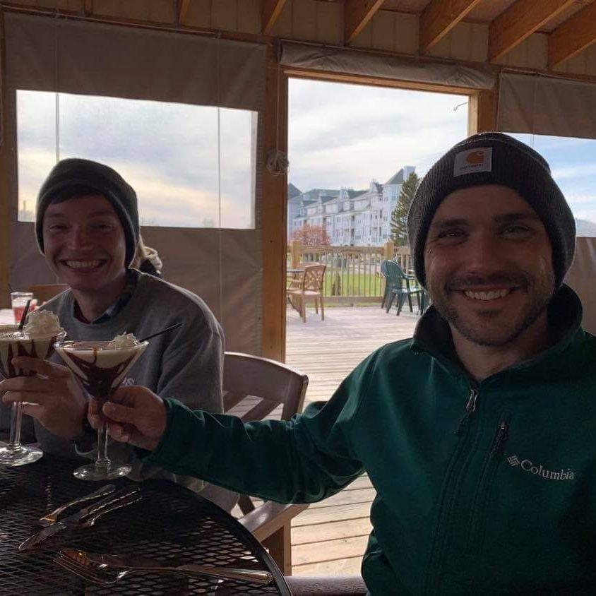 Patrick and Nick enjoying mudslides on our camping trip