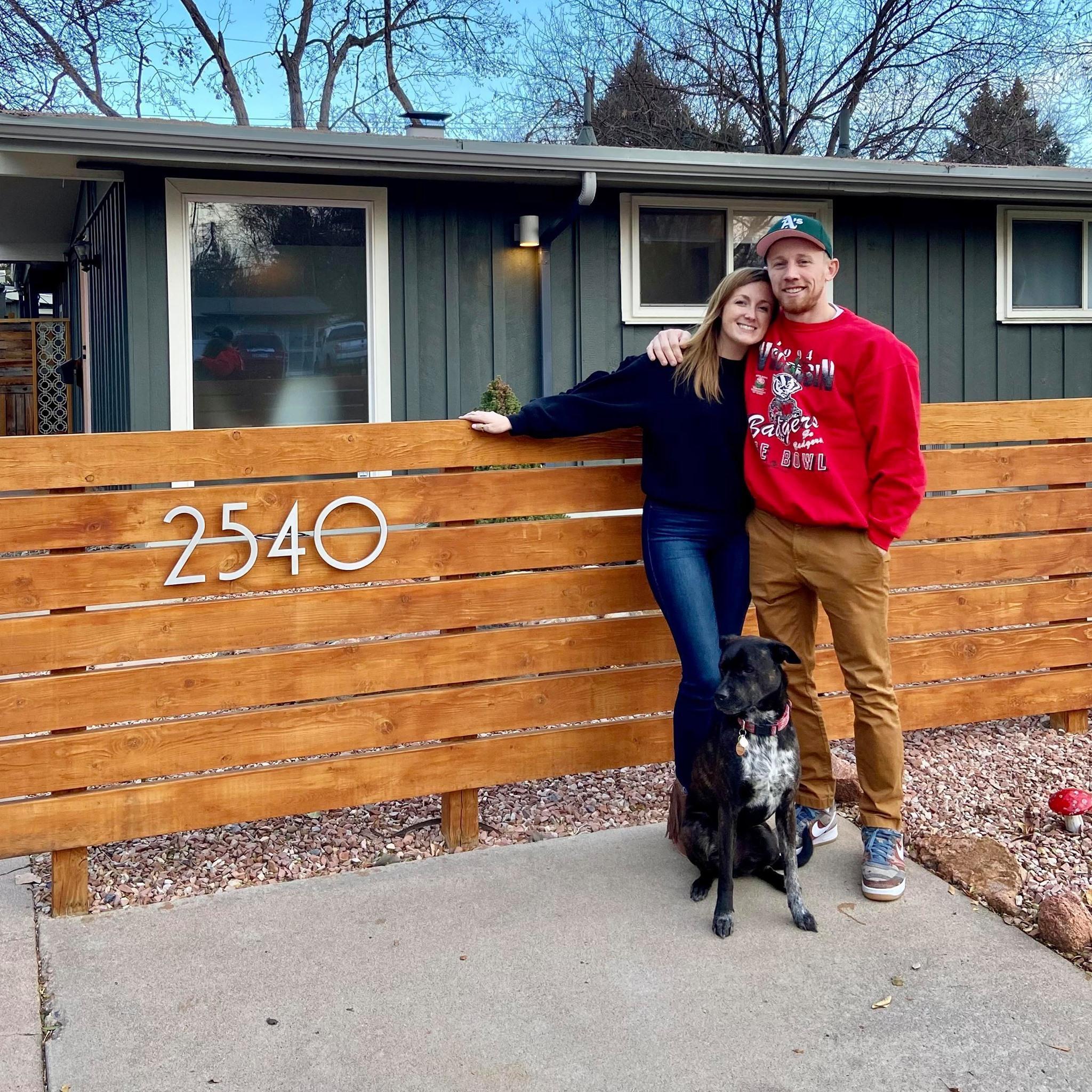 Our little family in front of our first home - Denver, CO