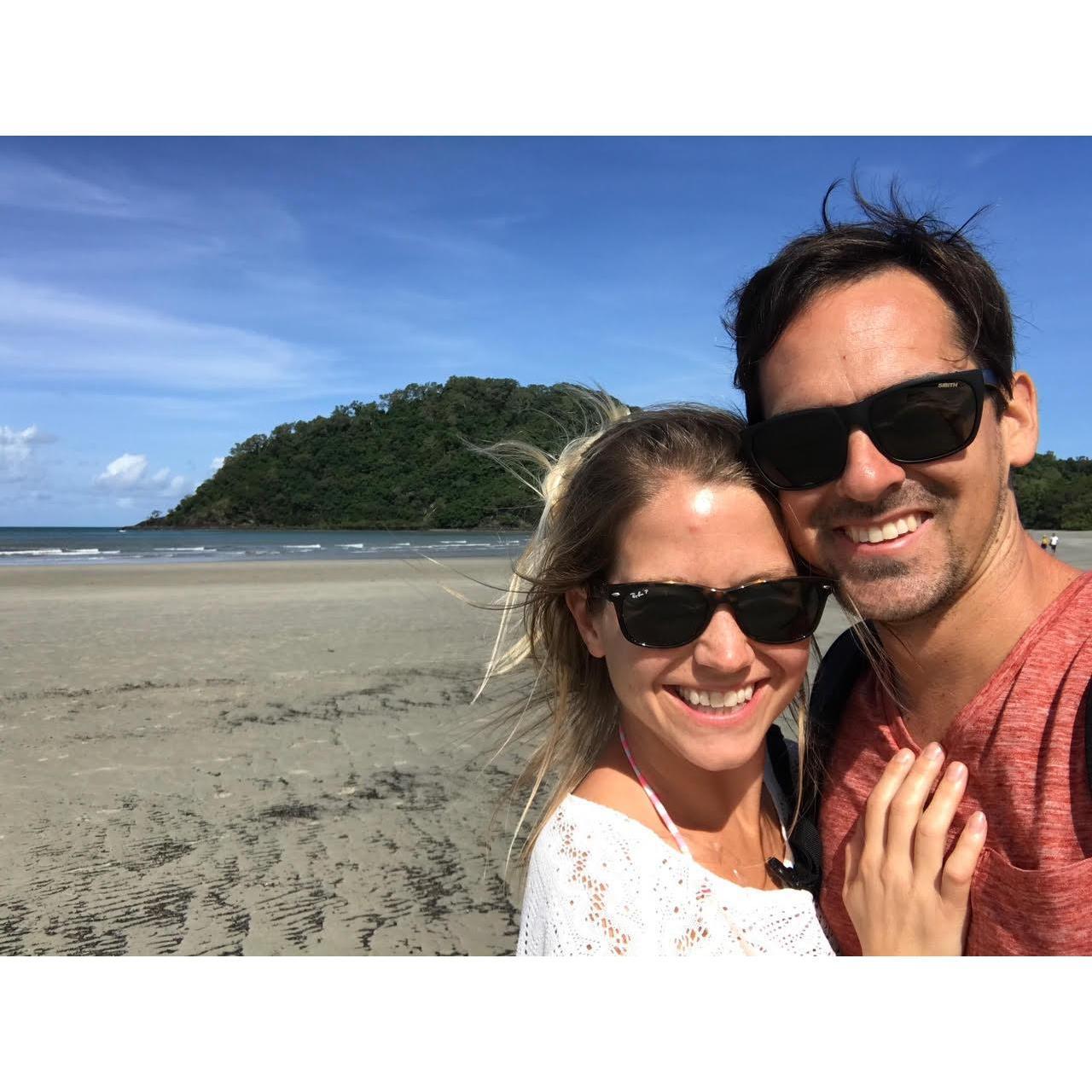 Us standing on the beach at Cape Tribulation, moments after we got engaged.