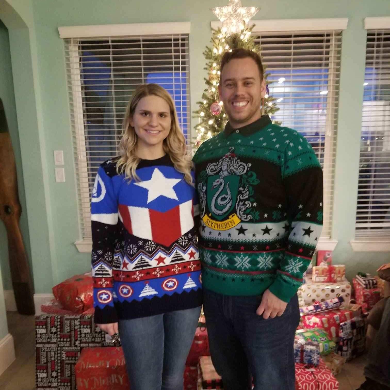 Leslie has an obsession with Marvel and Trey has an obsession with Harry Potter so naturally they needed Christmas sweaters