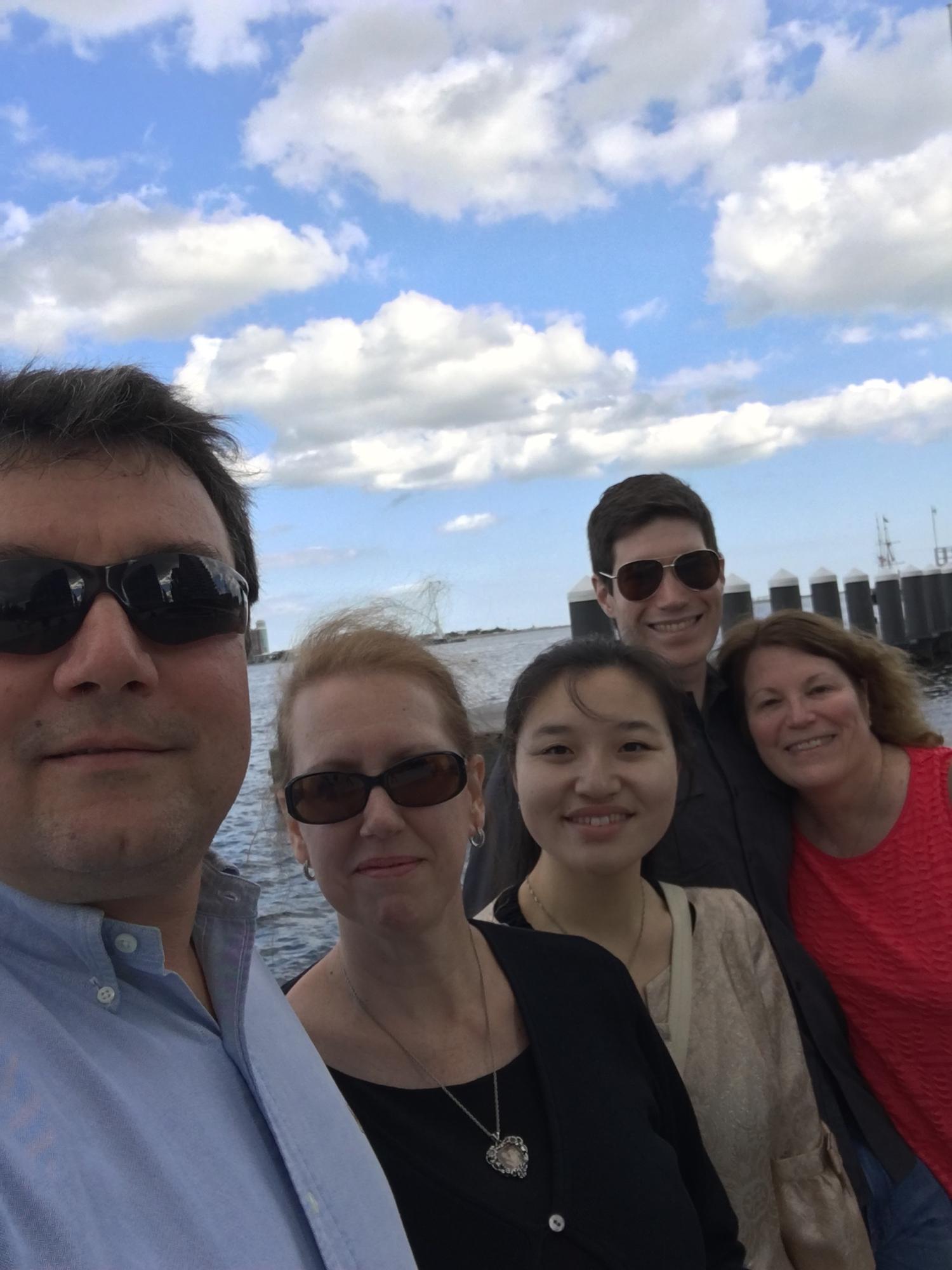 Selfie photo featuring Lia's dad, mom, Lia, Jon, & Jon's mom