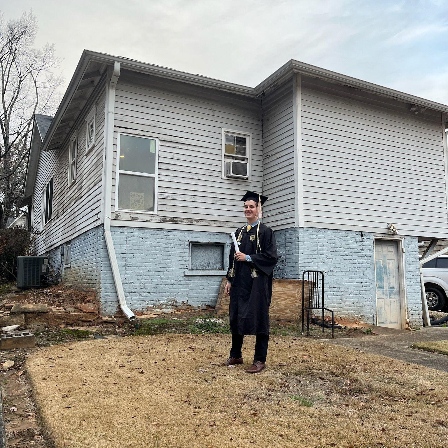Michael's GT graduation photo outside "The Tavern"... yes, we all know it needs some work