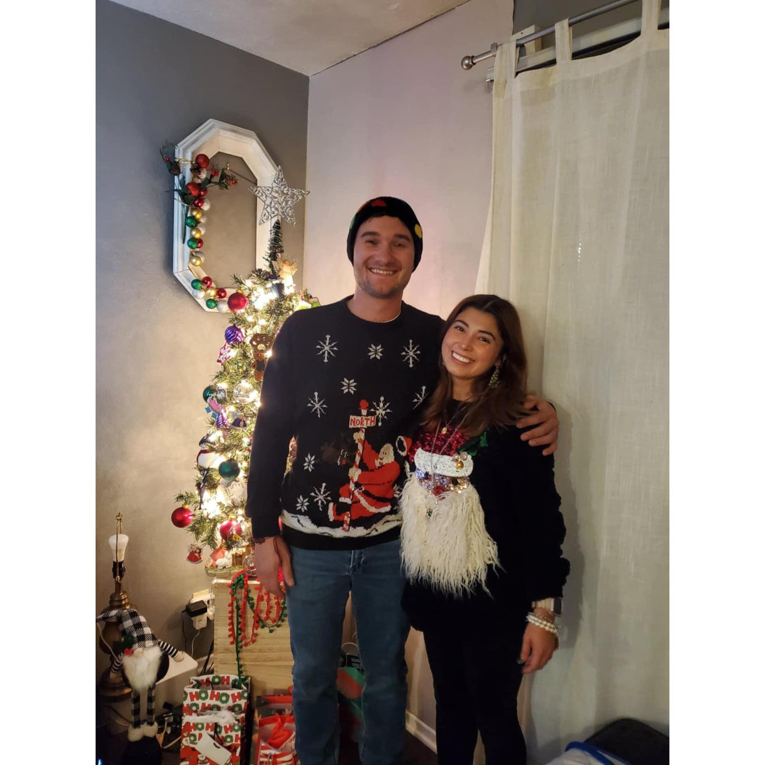 Our first holiday festivities. We both won Ugly Christmas Sweaters for the night!