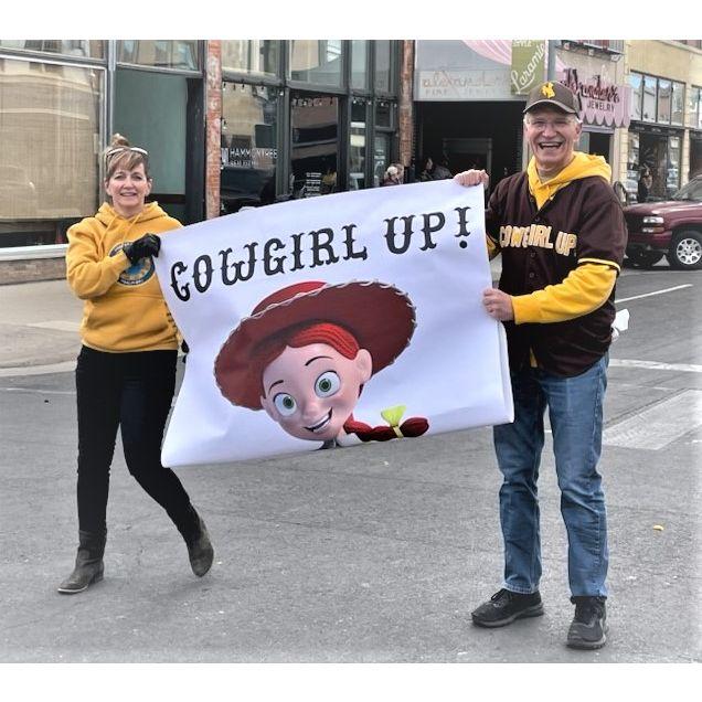 Homecoming parade...
He's got a girlfriend!