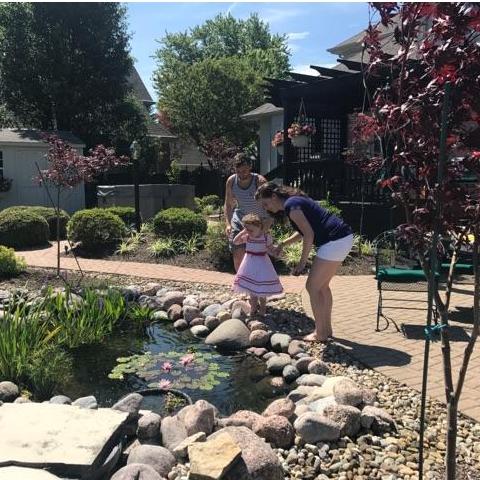 Year 1 - Teaching Evy how to feed the goldfish!