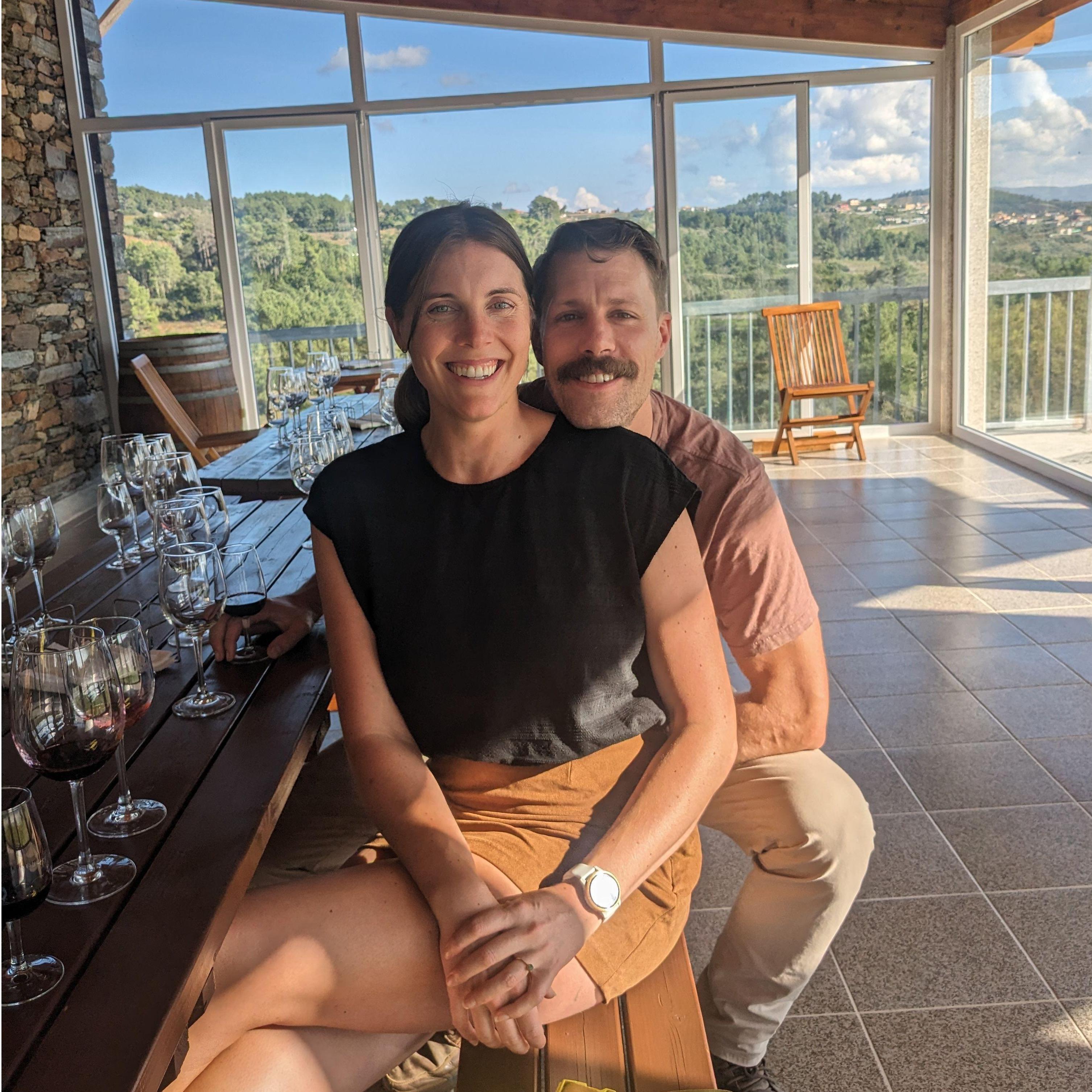 This is the day after we got engaged! We were on a wine tour with a bunch of hungover English women in Portugal. One of them farted loudly right before this picture.