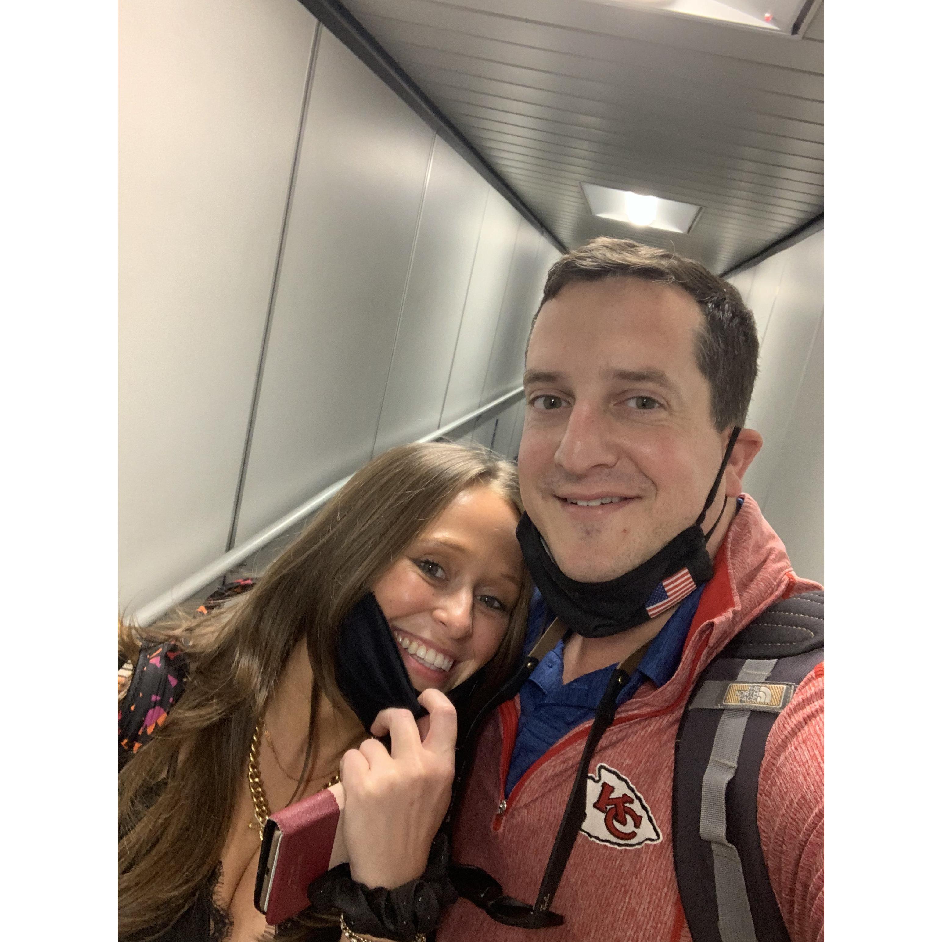 This picture pose was a standard photo traveling during Covid: on the jetway with our masks. We hope this won't be a thing when we go on our honeymoon.
