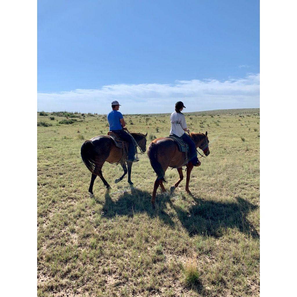JCs mom captured this photo from the first time Emma helped move a pasture at the ranch. There have been MANY days like this since!
