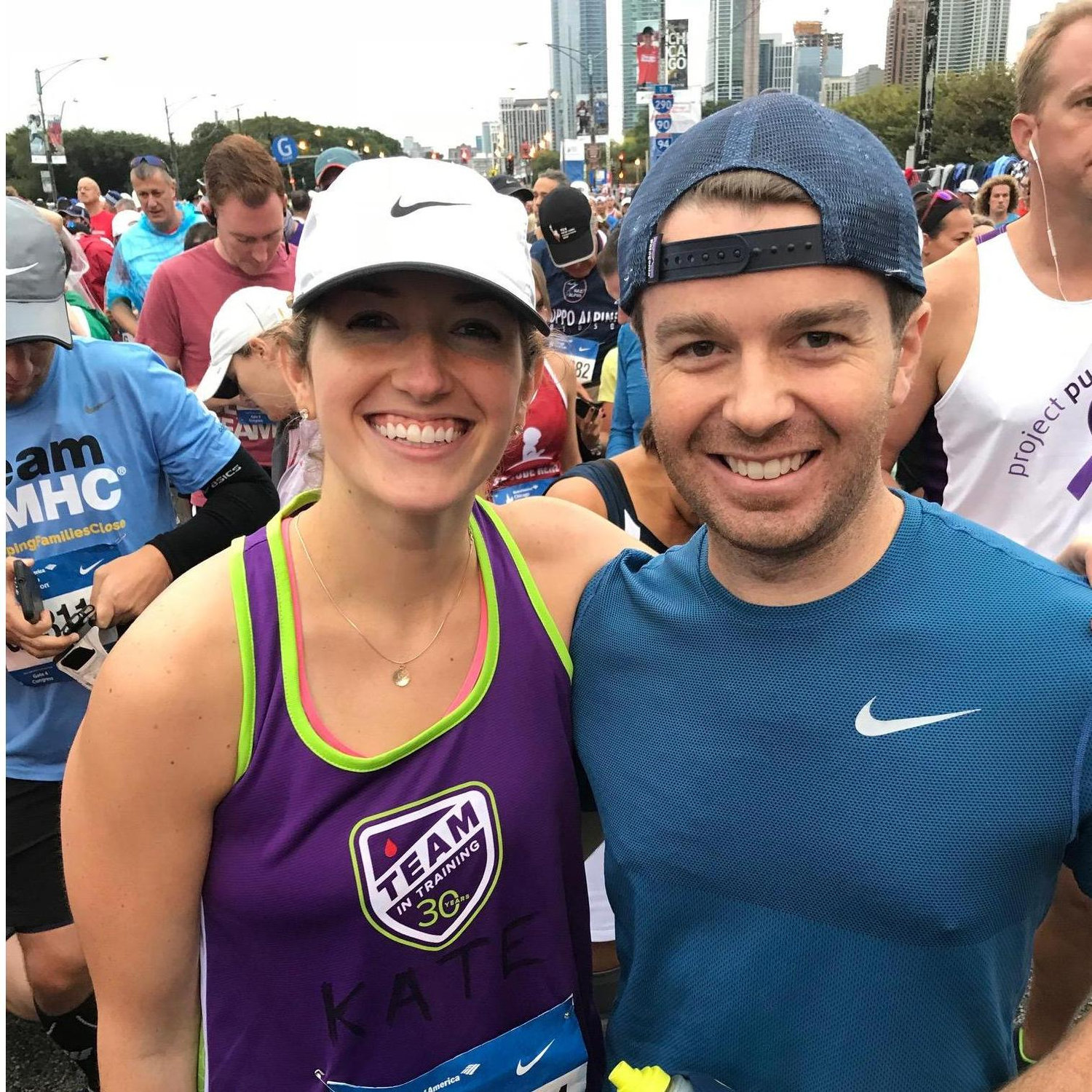 Smiling before we knew what pain a marathon causes