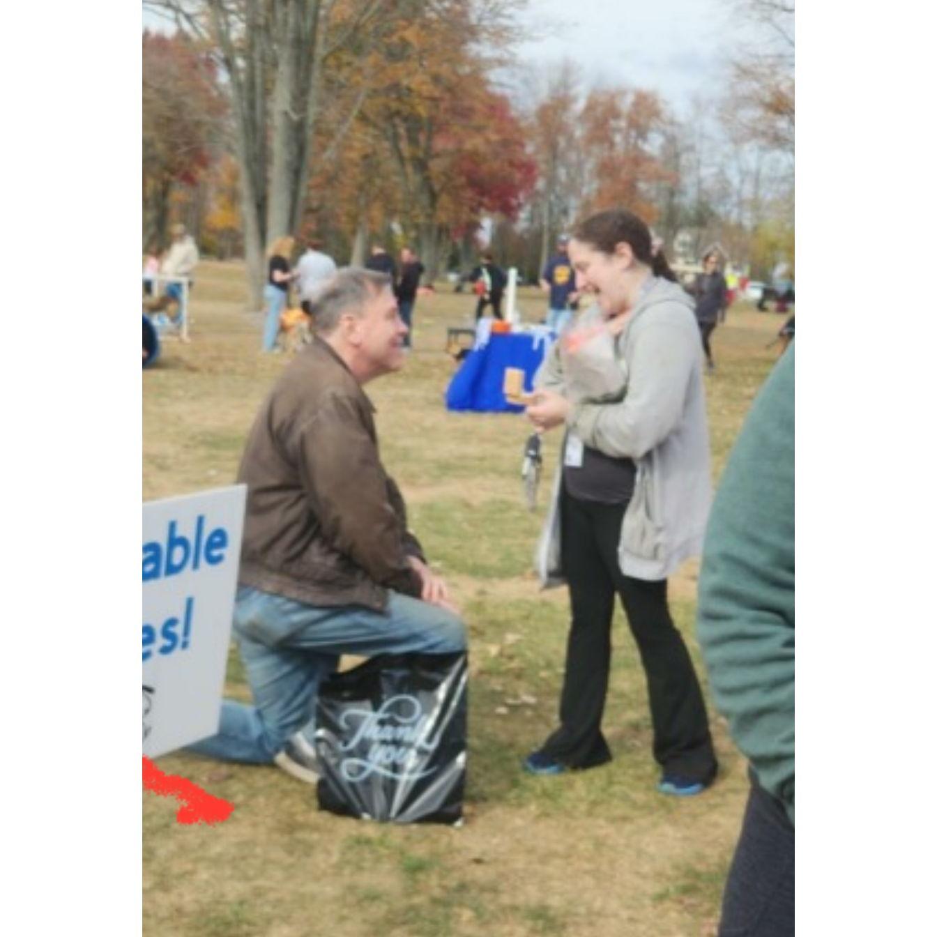 The actual proposal! This is the only photo we have of it. A random guy at the event saw what was happening and snapped a pic - thank you kind stranger!