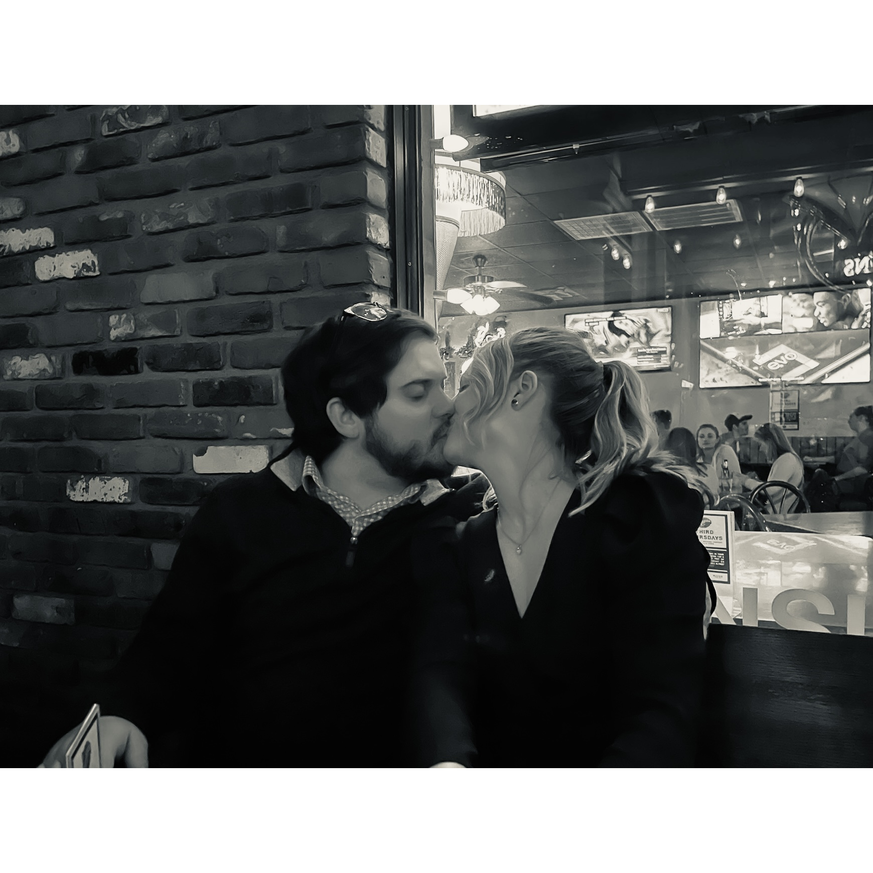 Re-creating our first kiss at the same location on the night of our engagement!