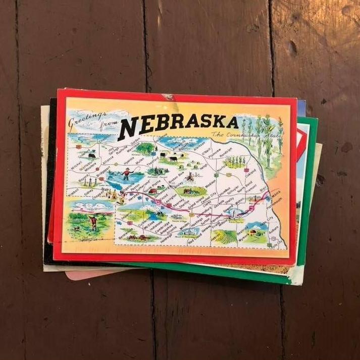 When TJ moved, he would send me postcards with love notes constantly.