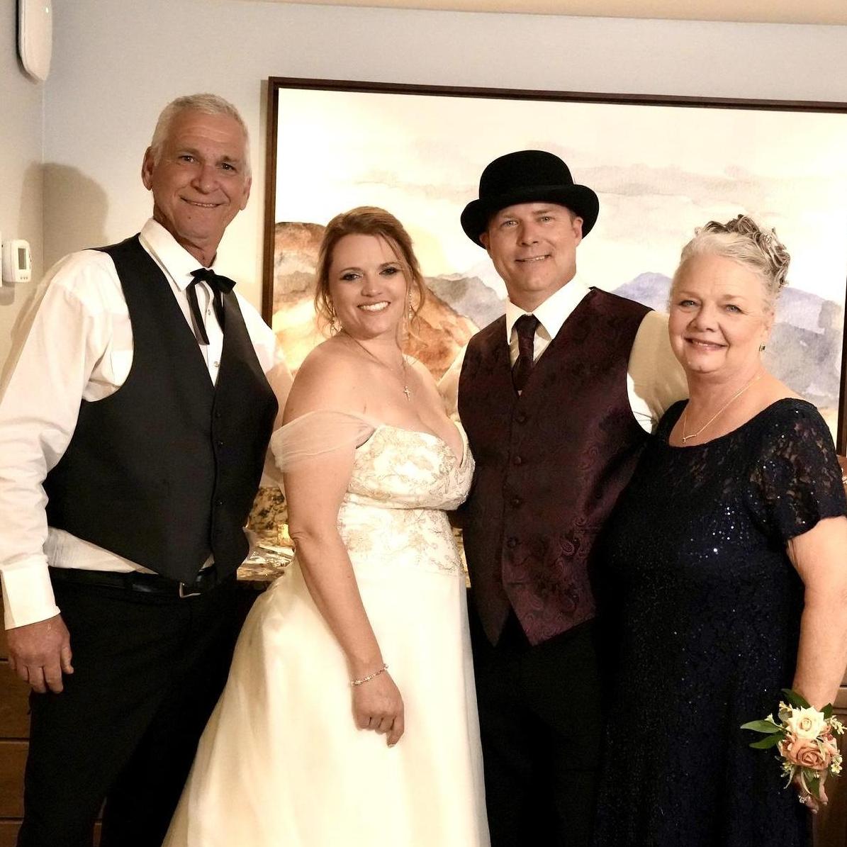 The Newlyweds and the Groom’s mom, Kathy Erickson, and stepdad, Micheal Erickson