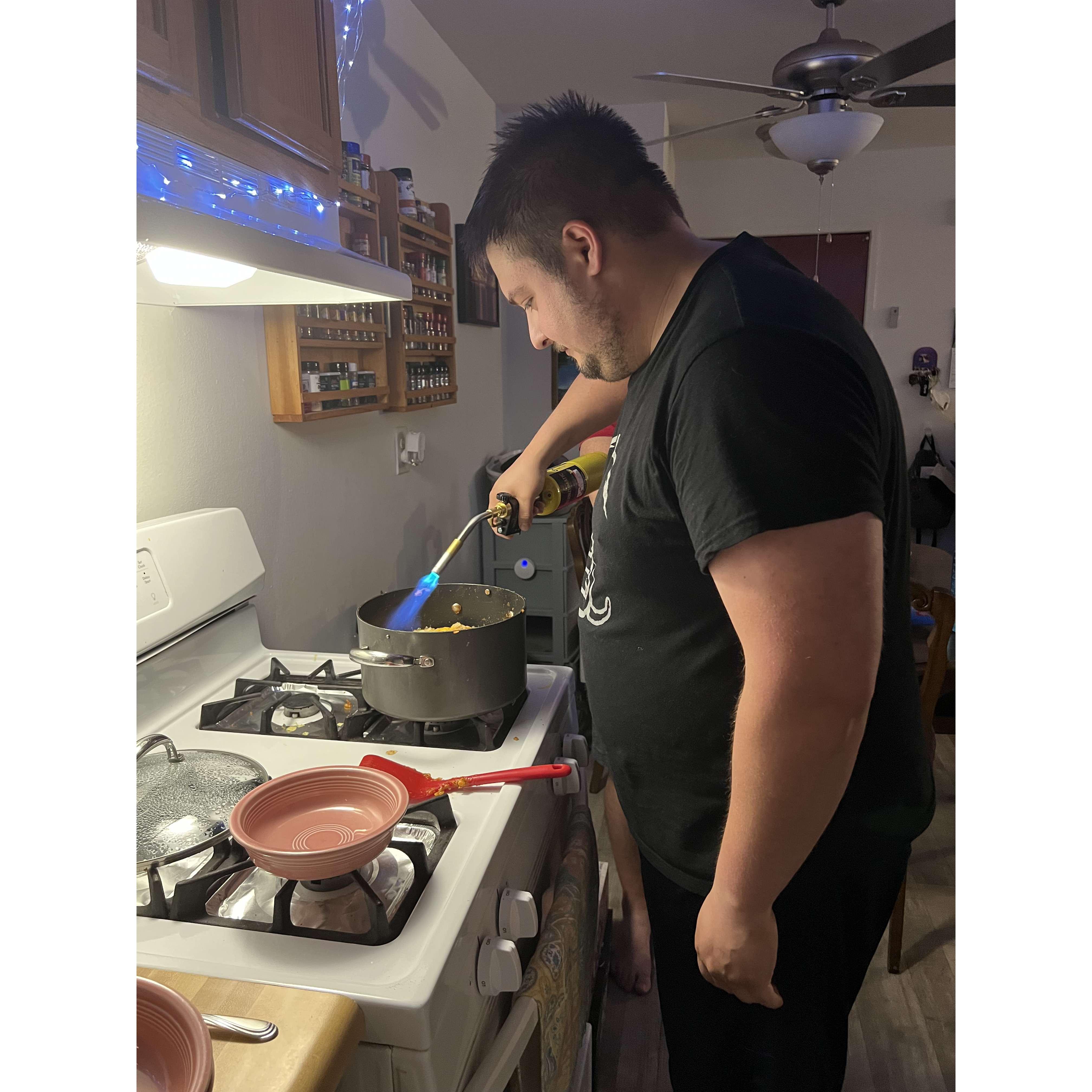 Making sure the cheese melts! 