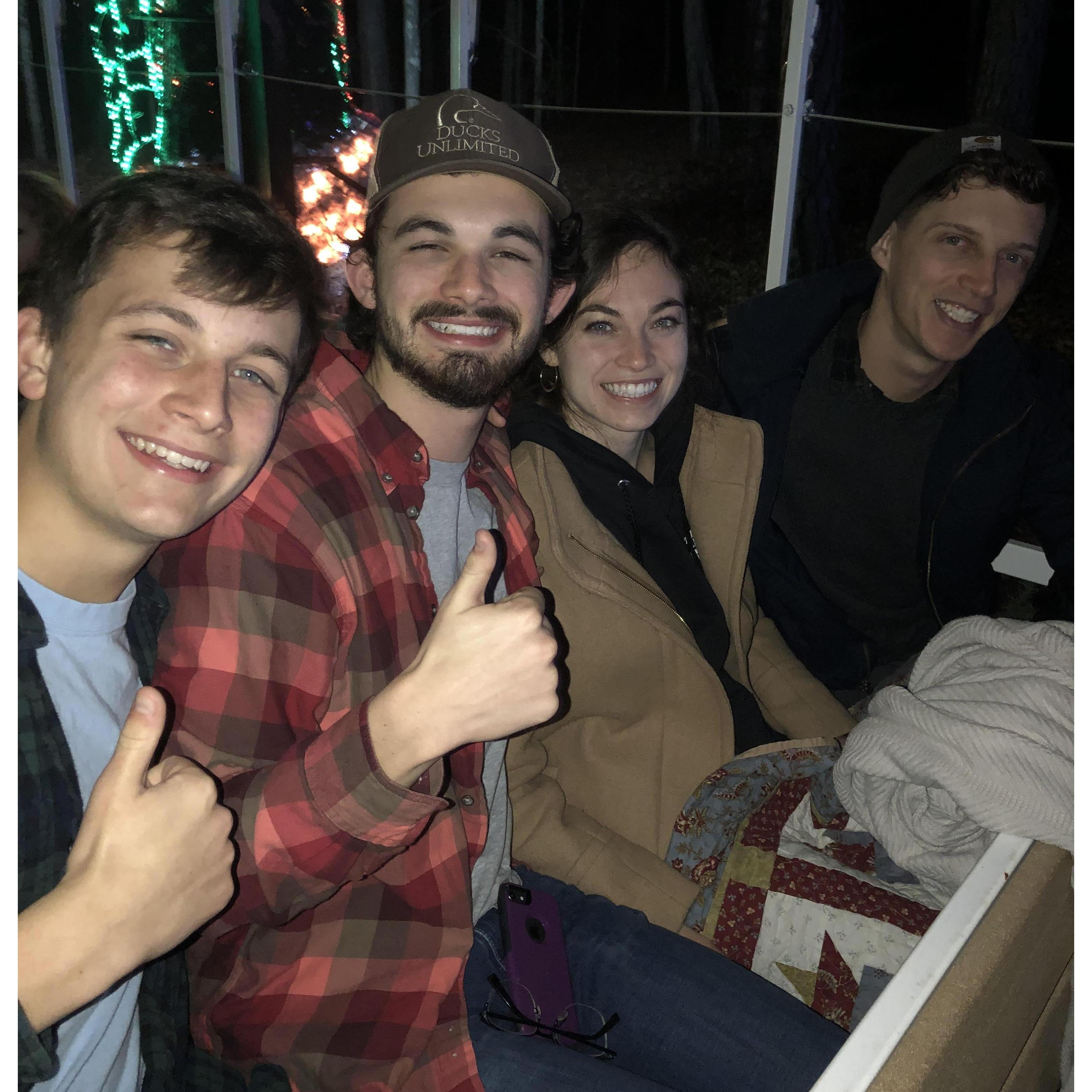 Samuel, Benjamin, Mary Beth, and Anthony on a trolley ride to look at Christmas lights