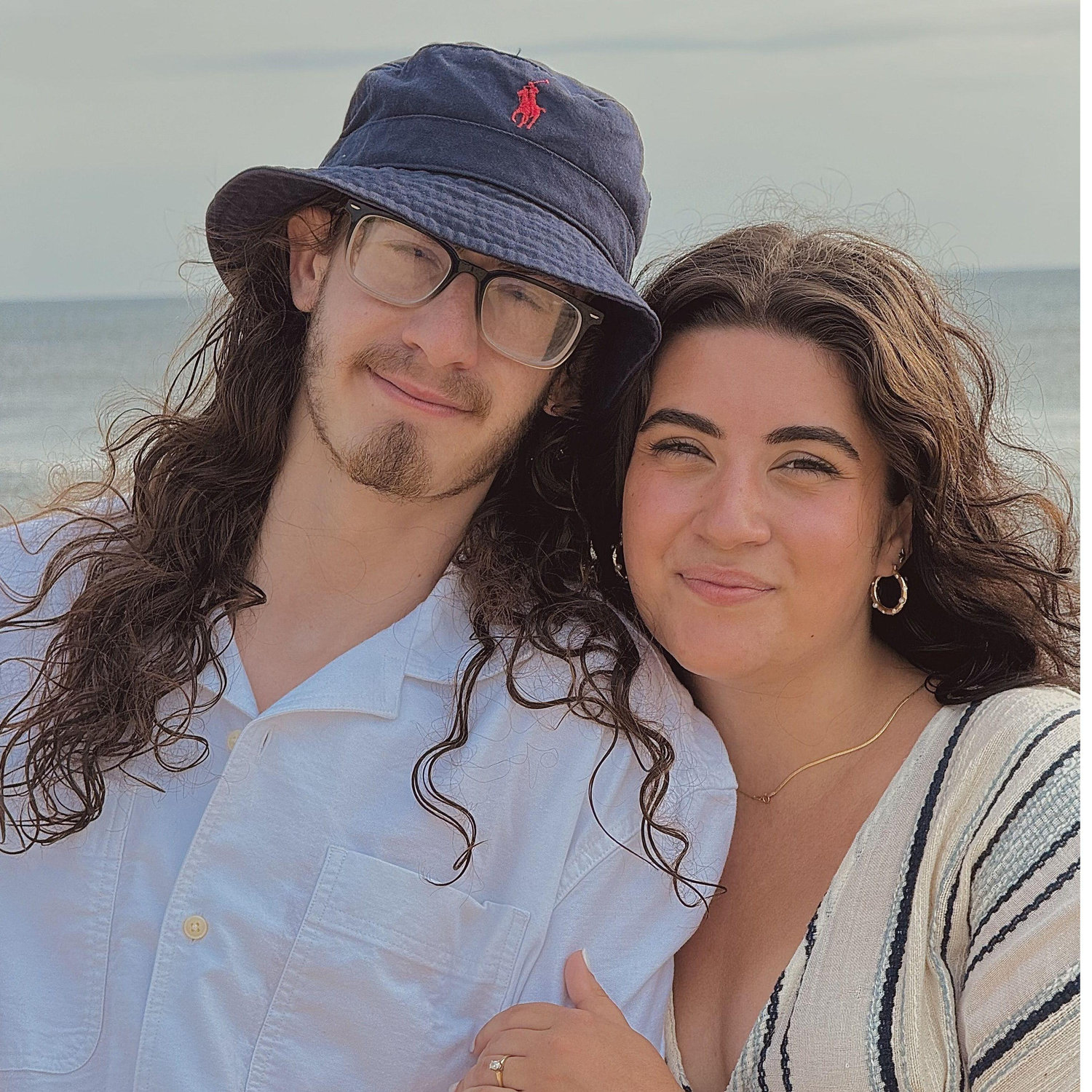 Right after this, a huge wave came and soaked us! Thankfully got a good picture
