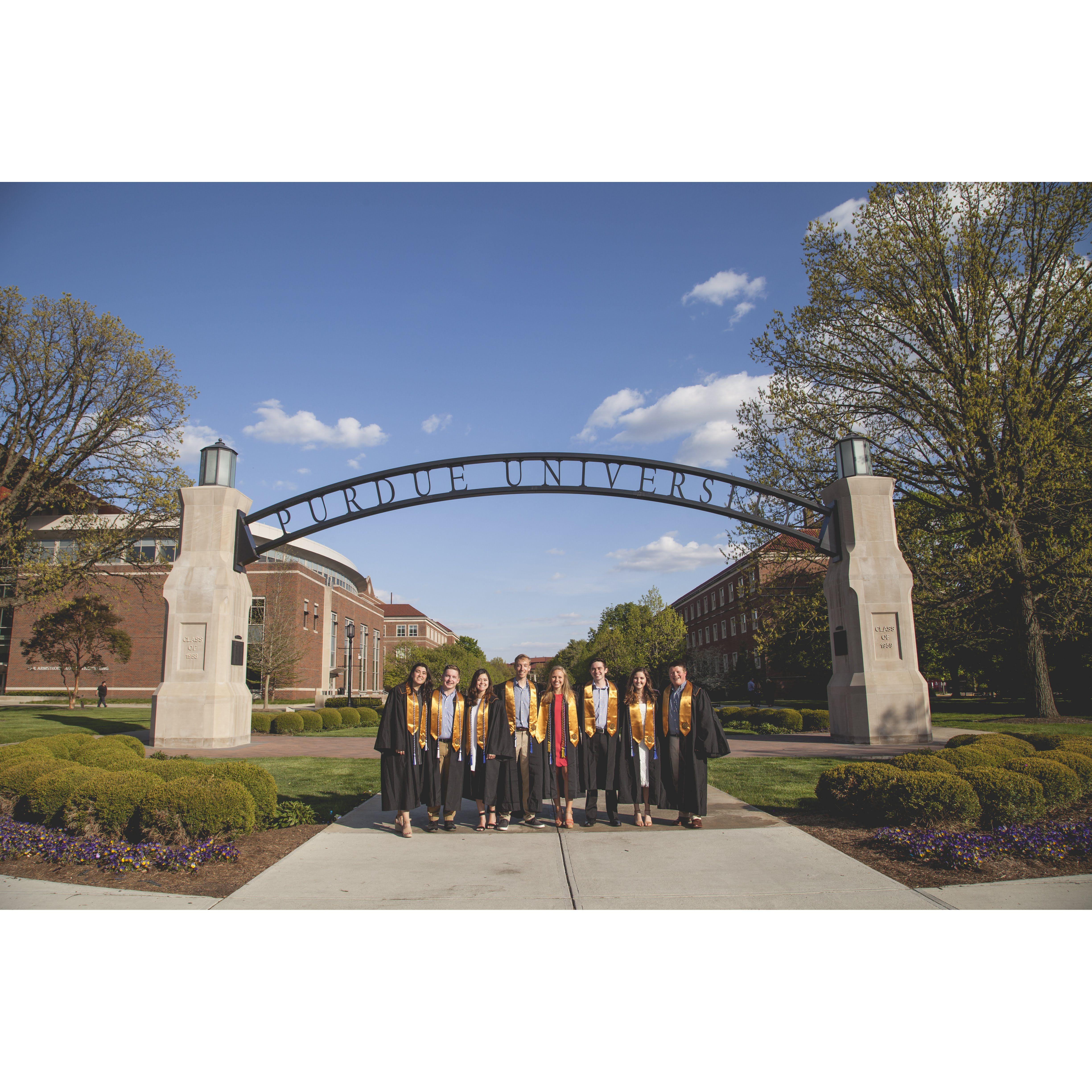 More grad photos under the Purdue Arch