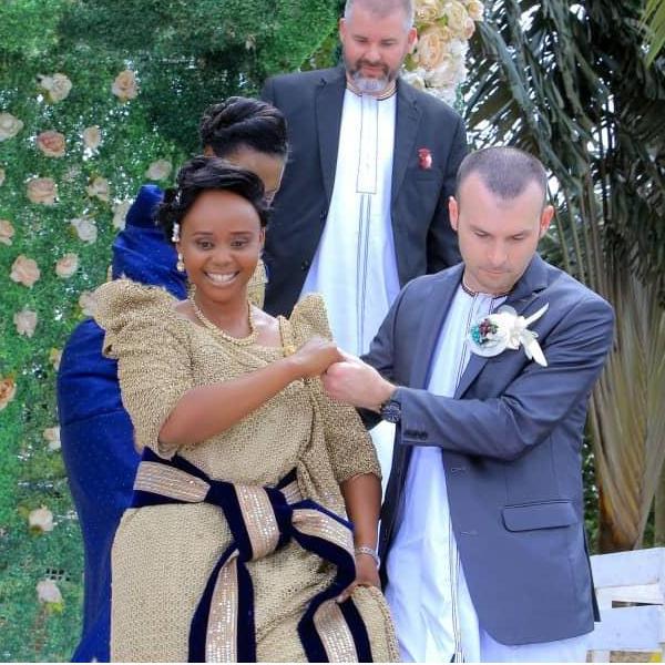 Trying not to fall as we descend the slippery stairs at our Introduction Ceremony in Uganda