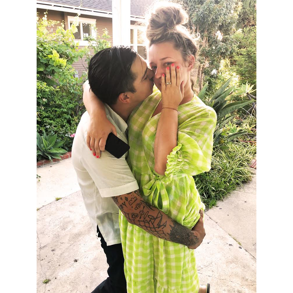 Right after Diego proposed. He said “every day with you forever” and Billy Joel was playing on the record player. Carl had a baby blue bow tie on. We had champagne and broke one flute.
