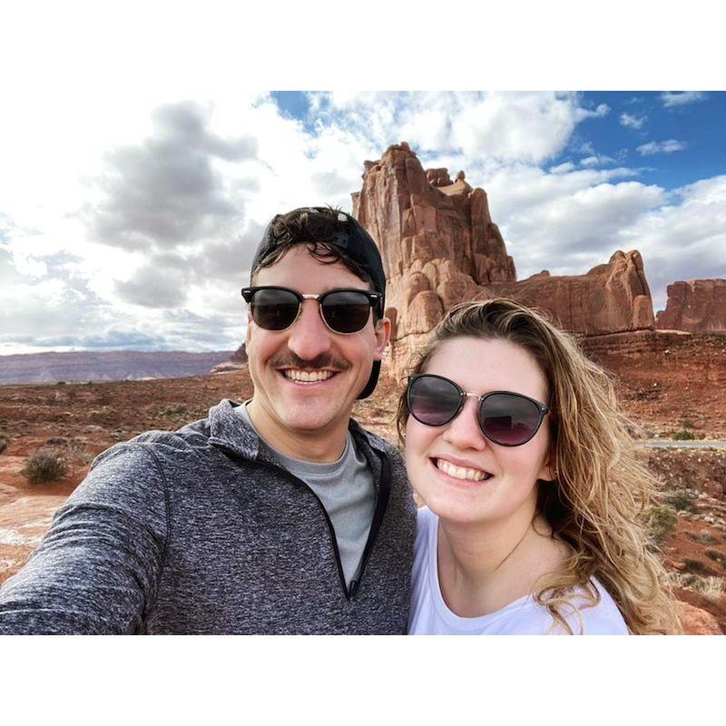 In Arches National Park Thomas and I got caught in the rain while hiking. But, its okay! We were still so happy to be there and met several nice dogs after this photo was taken