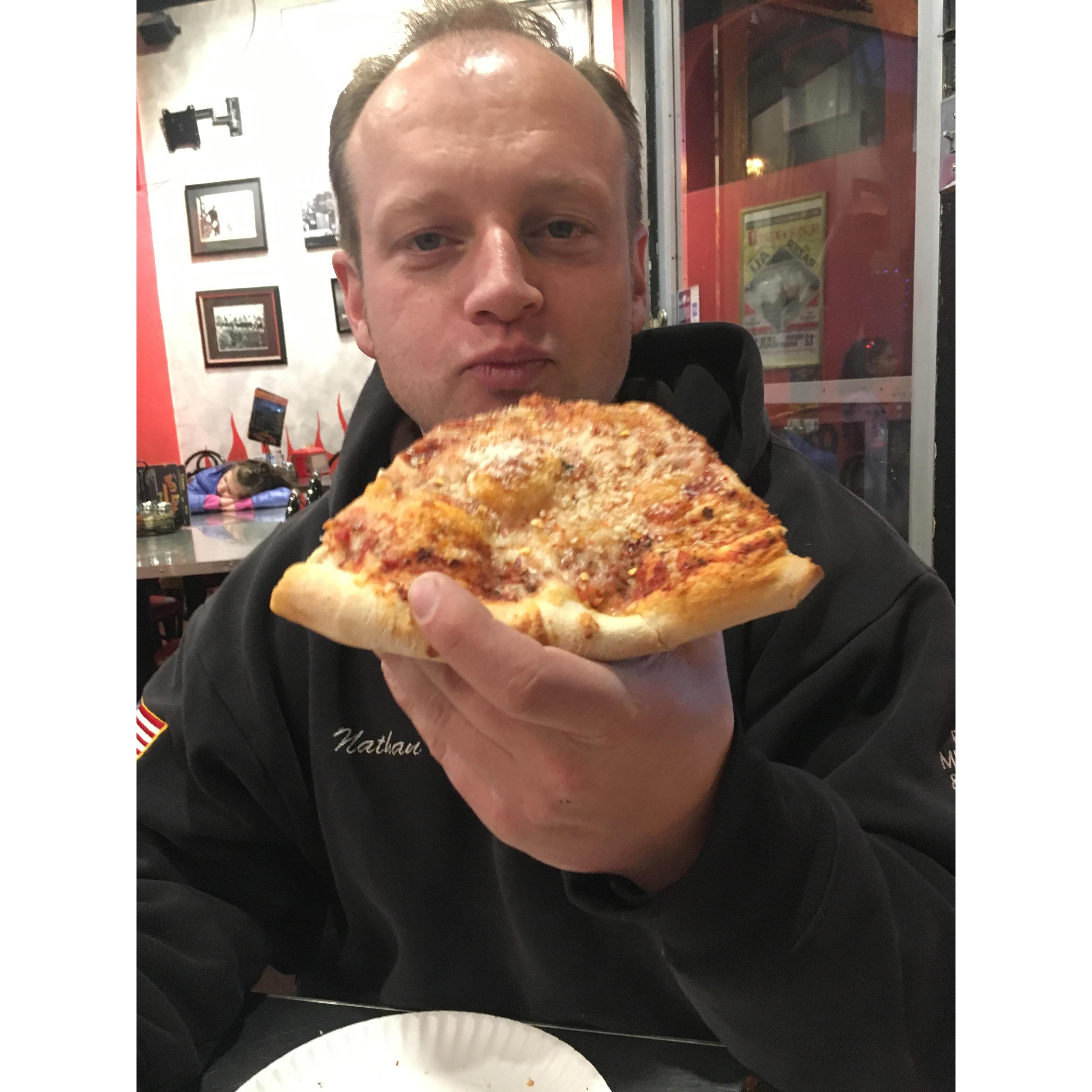 How can someone look this good eating pizza?