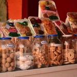 Portal de los dulces (Colorful stalls of traditional sweets)