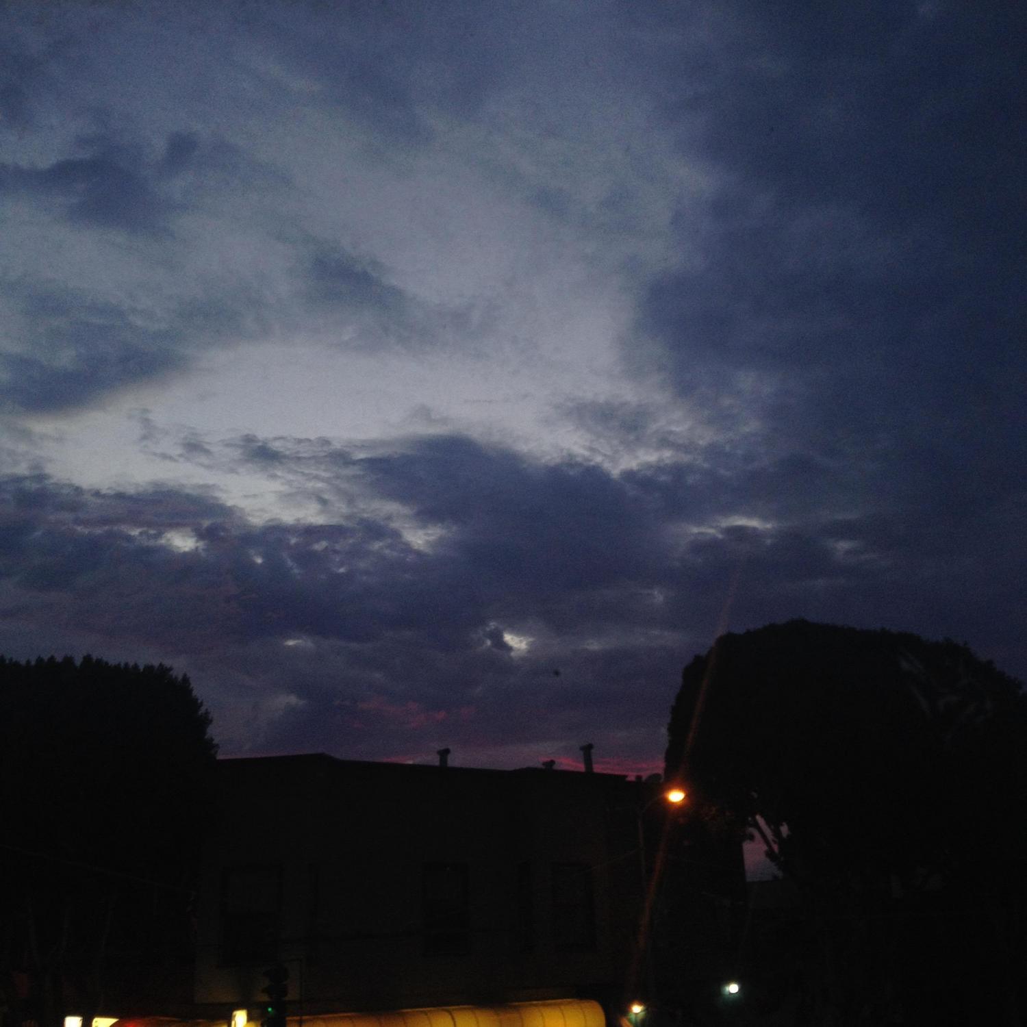 Neighborhood fireworks celebrating our anniversary on Rocky's first night in the house, Fourth of July, 2015.